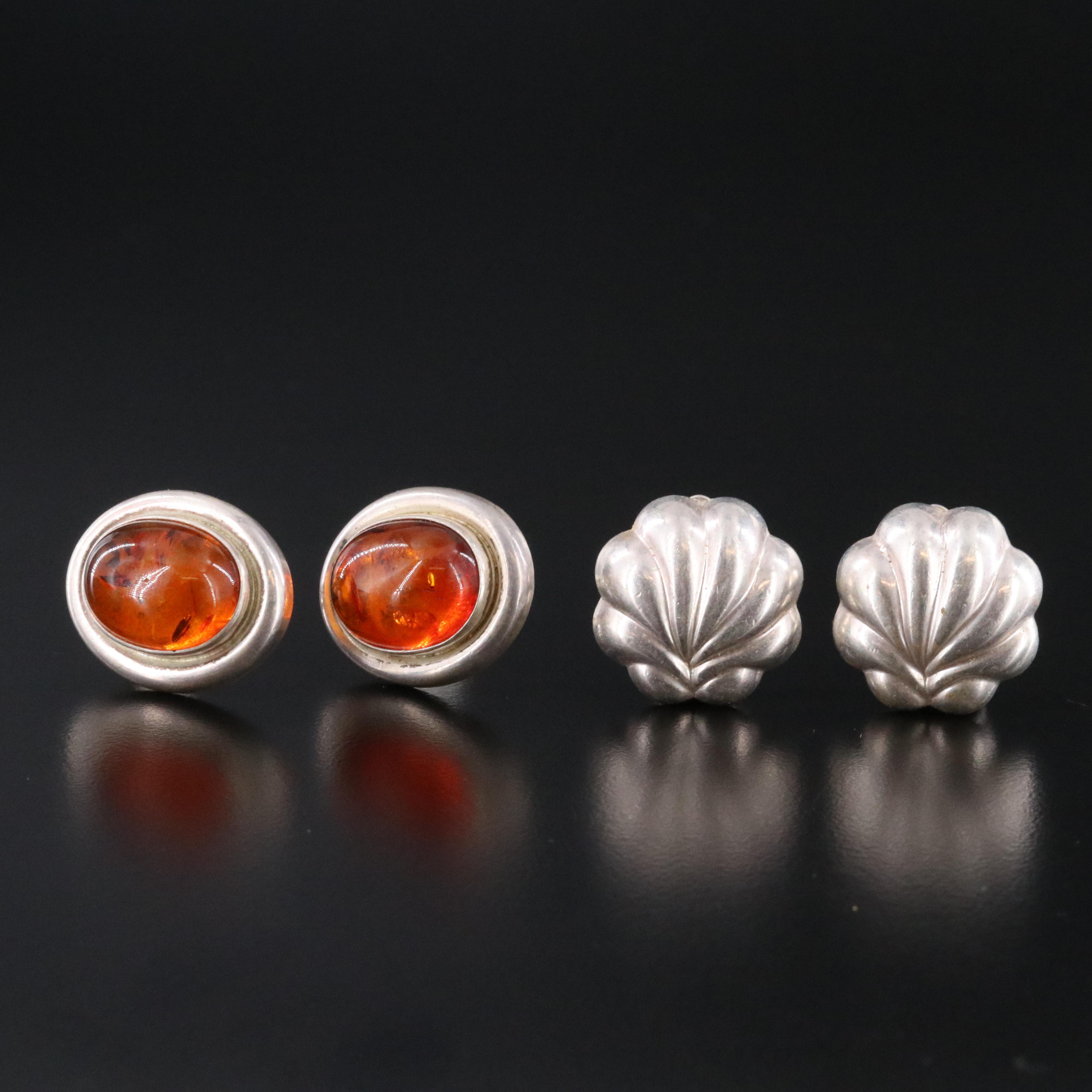 Amber and Black Onyx Featured in Sterling Jewelry