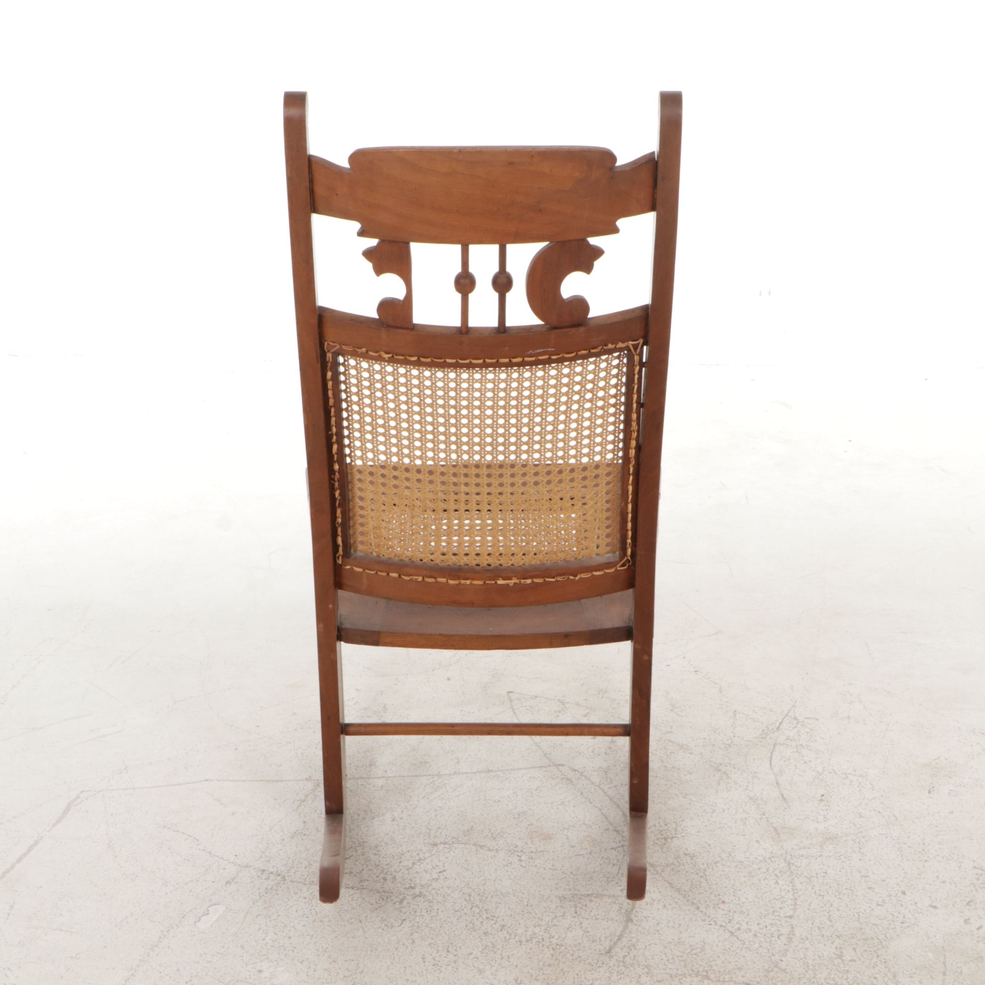 Cane and Carved Wood Rocking Chair