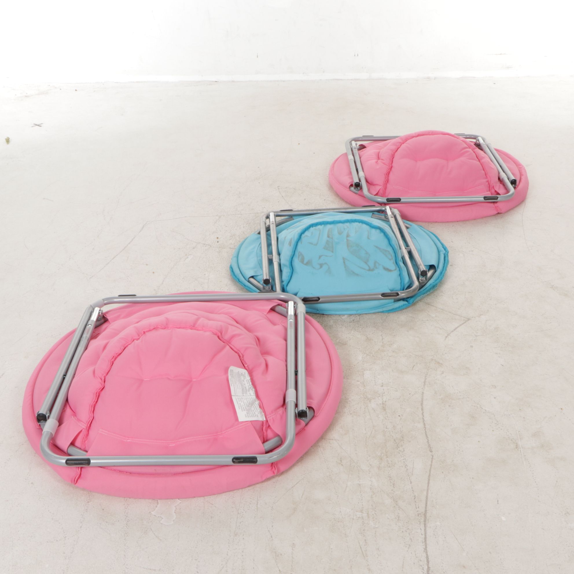 Three Folding Saucer Chairs