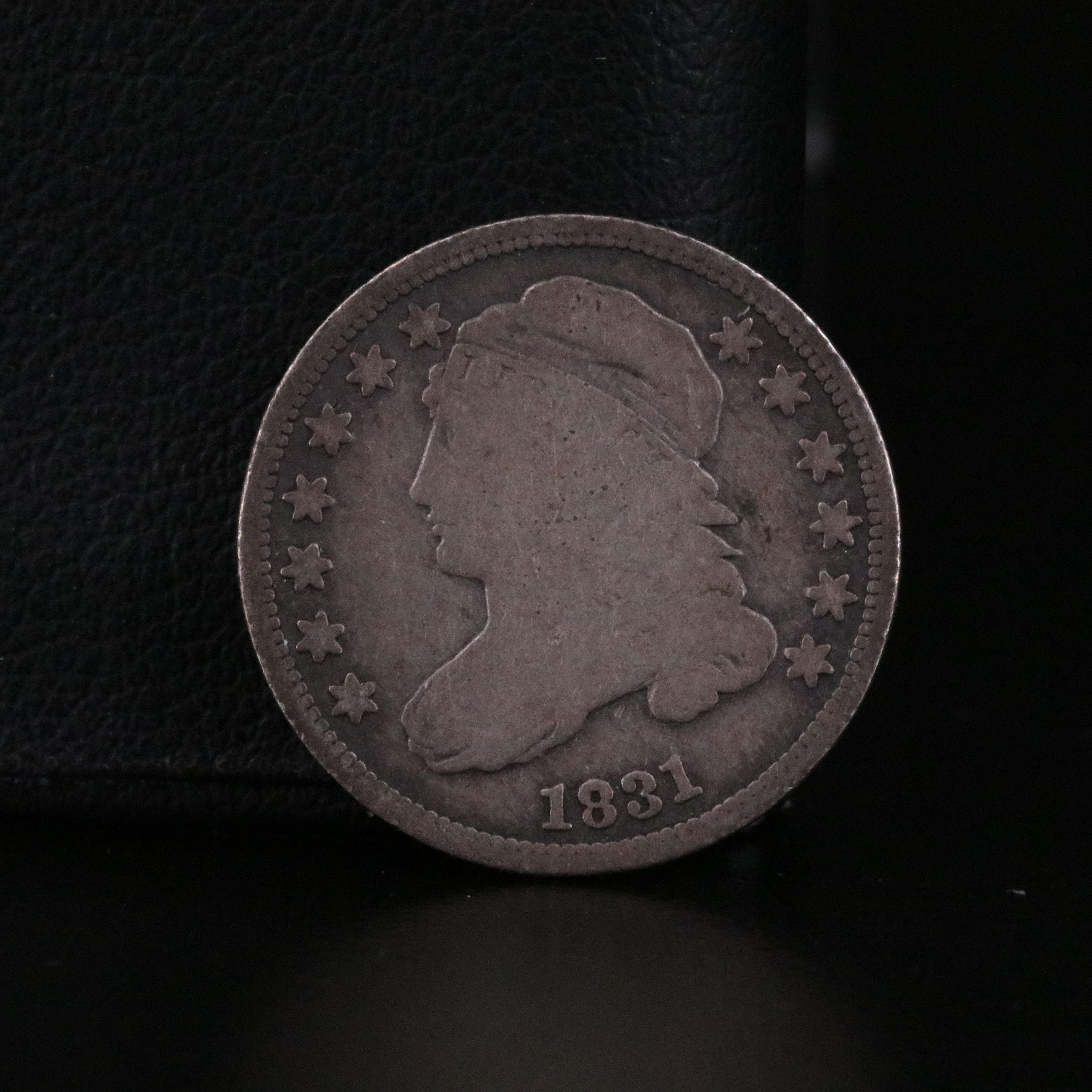 Three Early Capped Bust and Seated Liberty Coins with an 1831 Capped Bust Dime