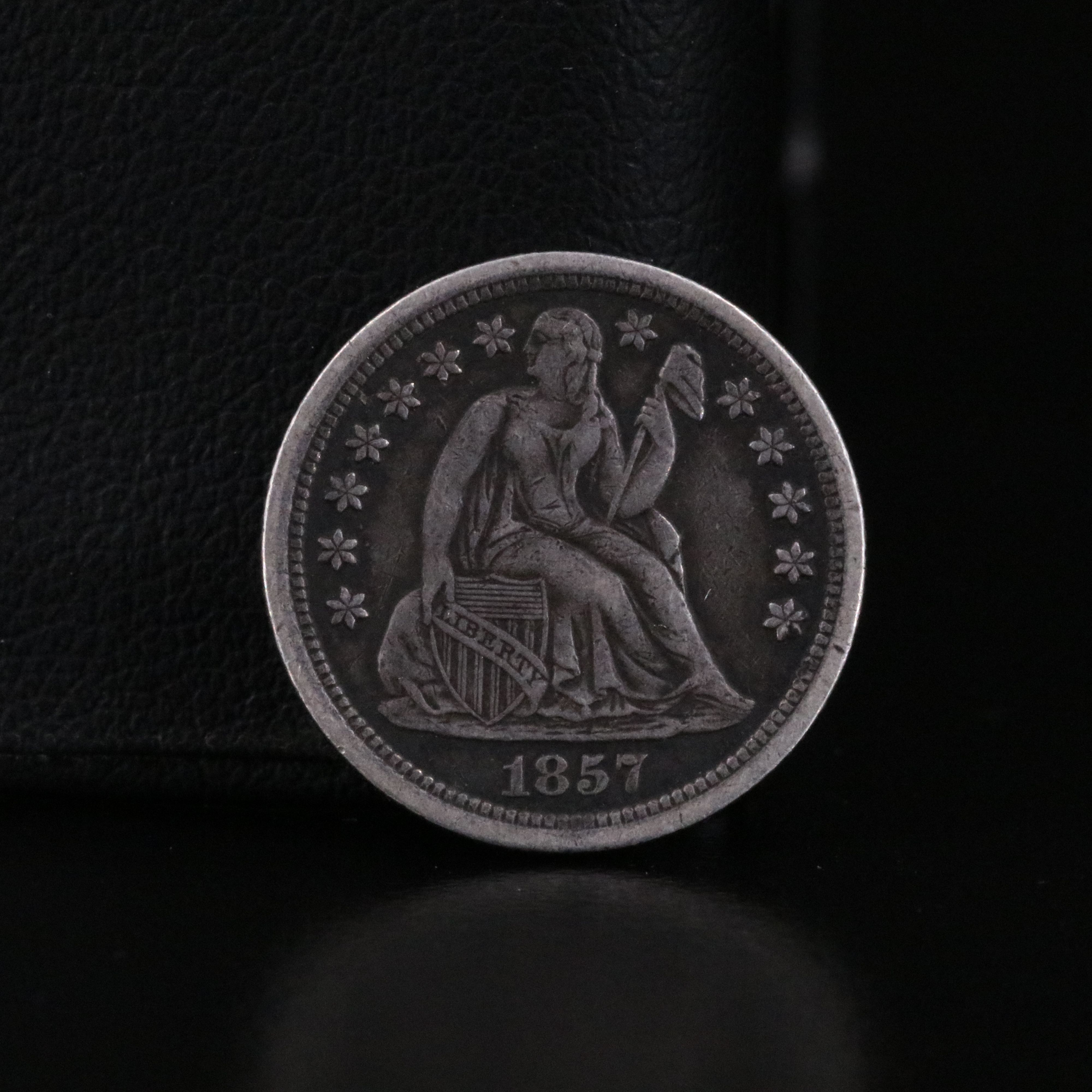 Three Early Capped Bust and Seated Liberty Coins with an 1831 Capped Bust Dime