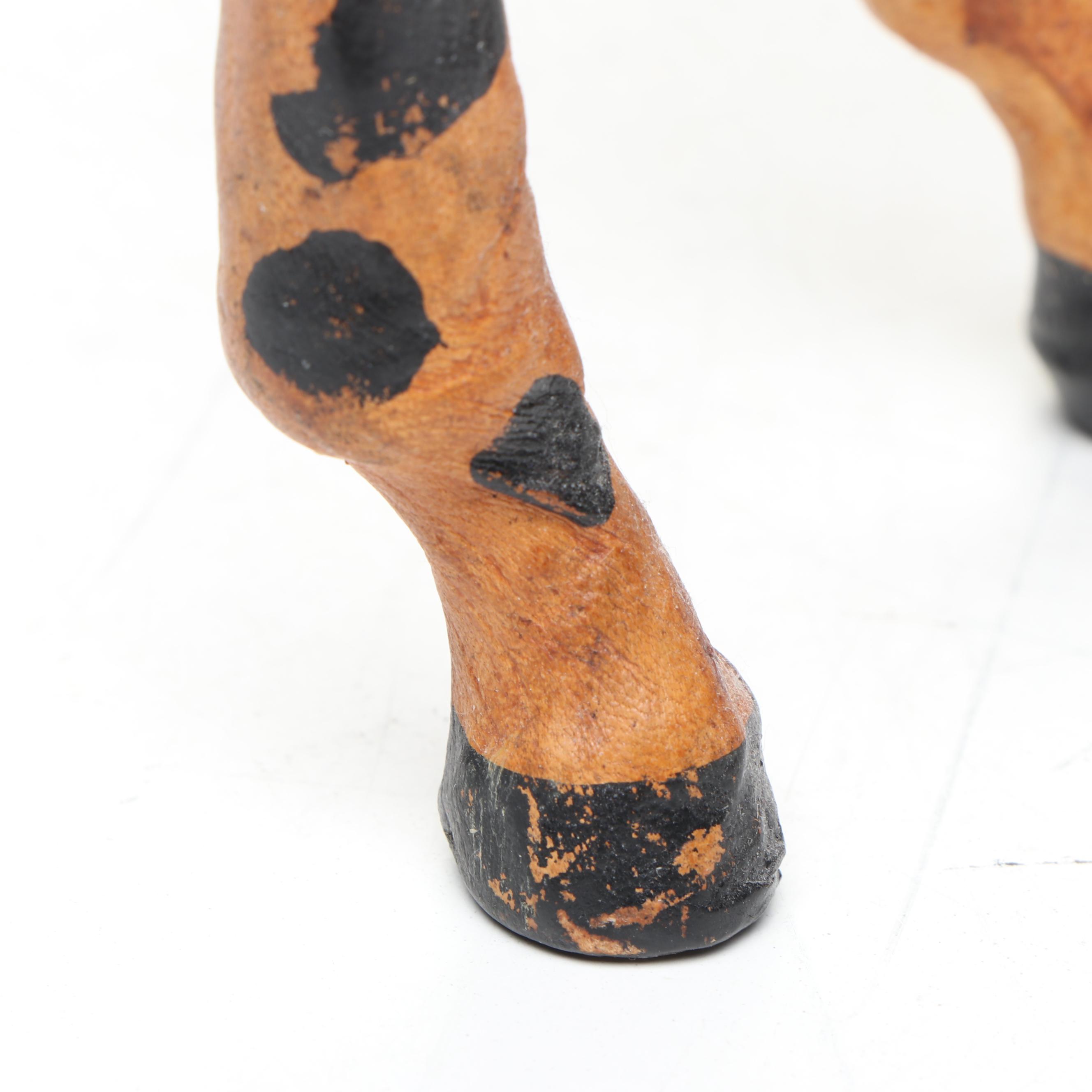 Leather and Hand-Carved Wooden Giraffe Figures