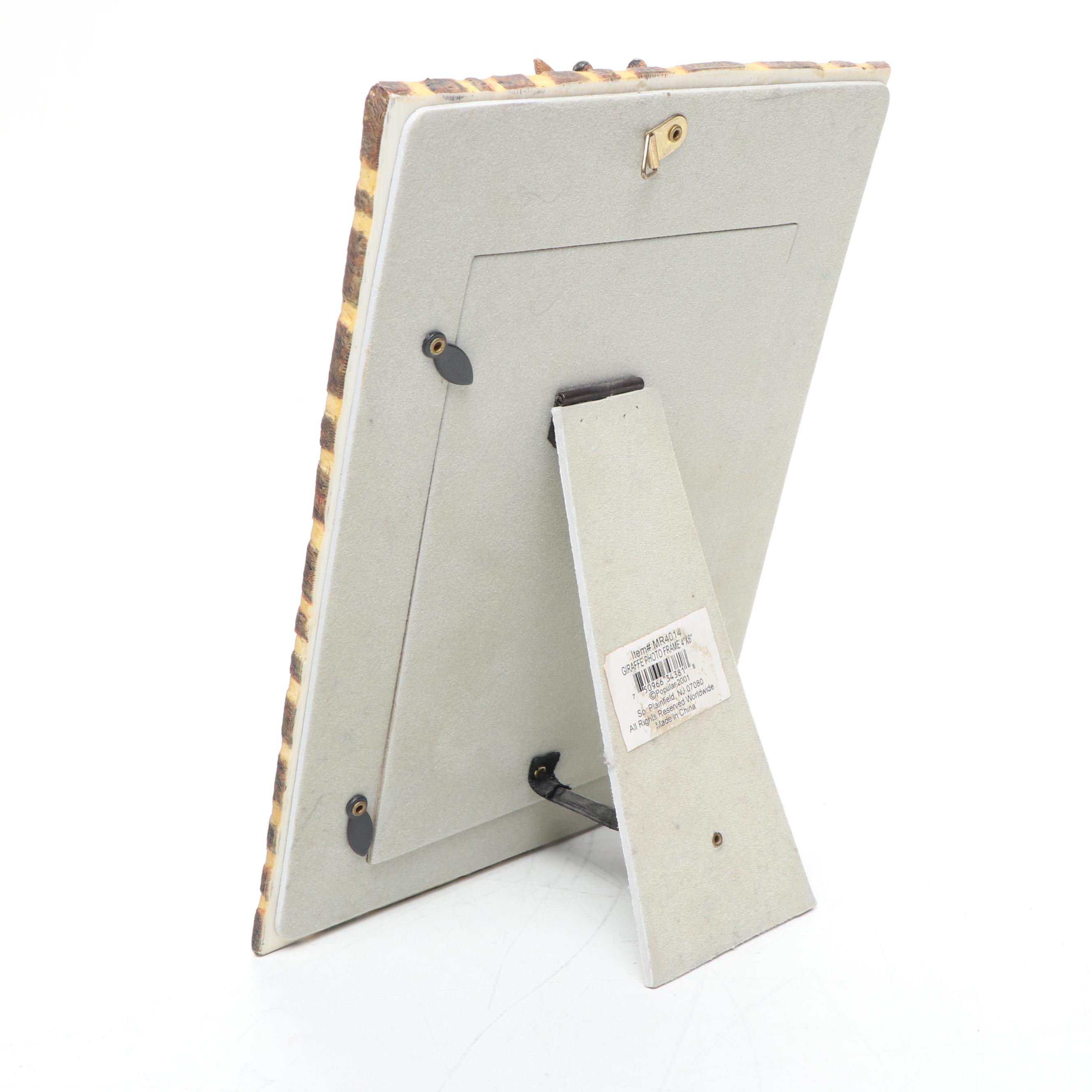 Pierced Sheet Metal Giraffe Votive Holder with Other Giraffe Décor