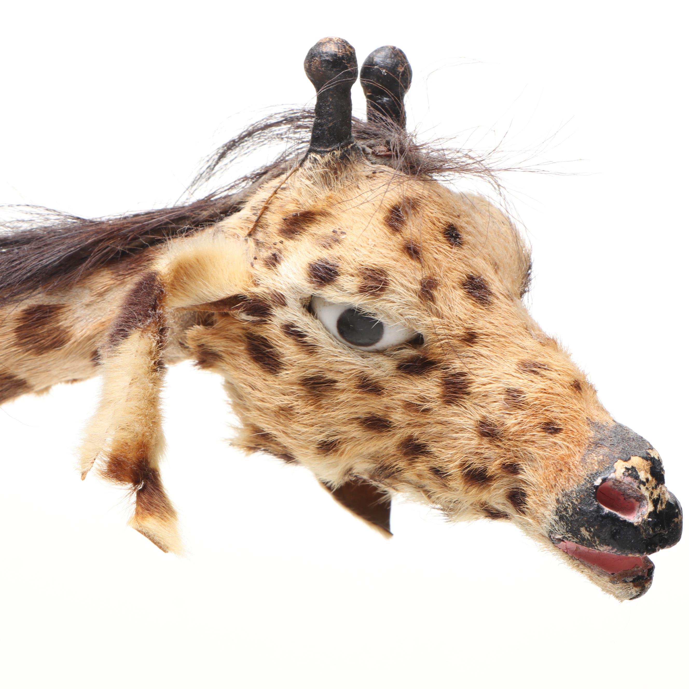 Pierced Sheet Metal Giraffe Votive Holder with Other Giraffe Décor