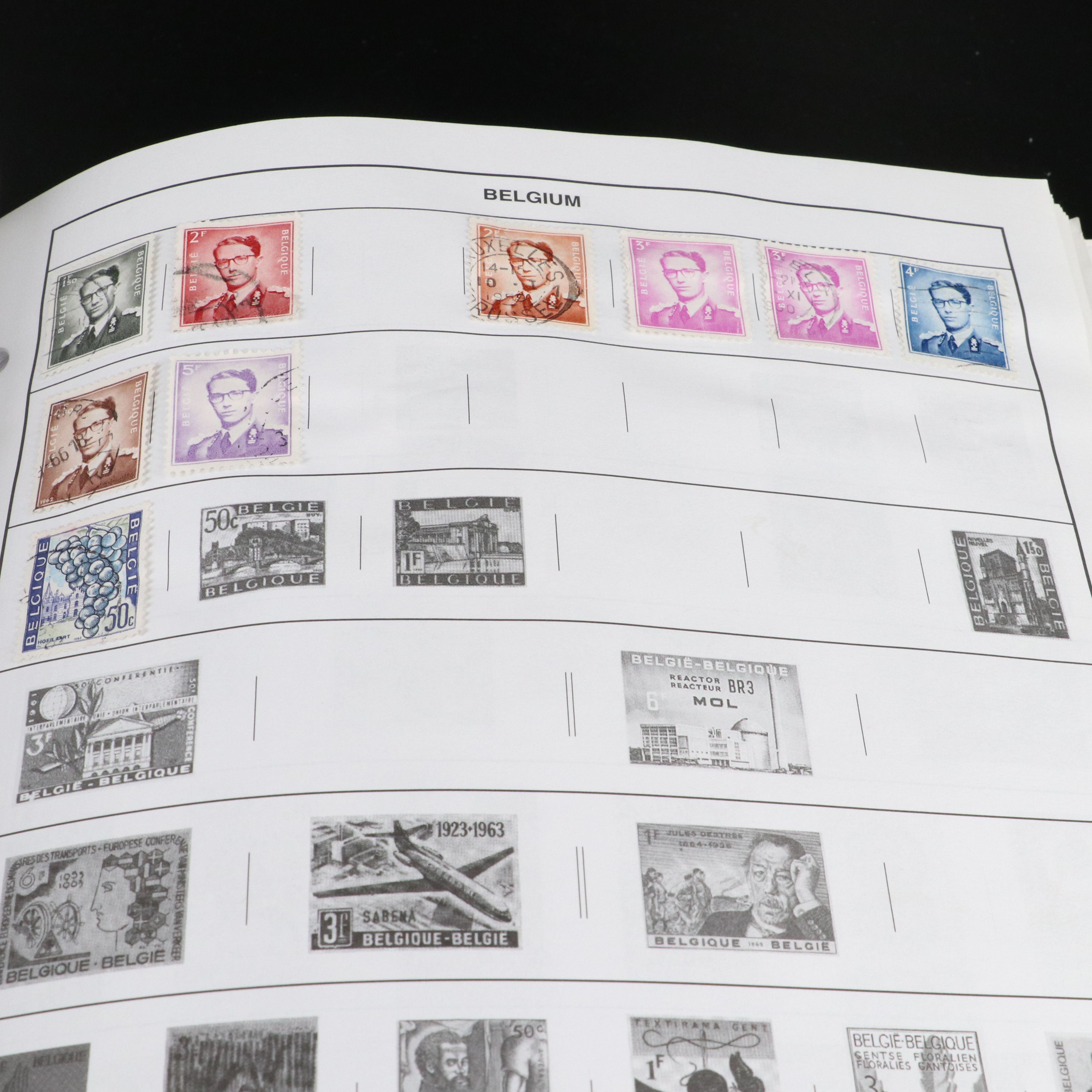 Two Harris "Statesman" World Stamp Albums Part 1 and Part 2.