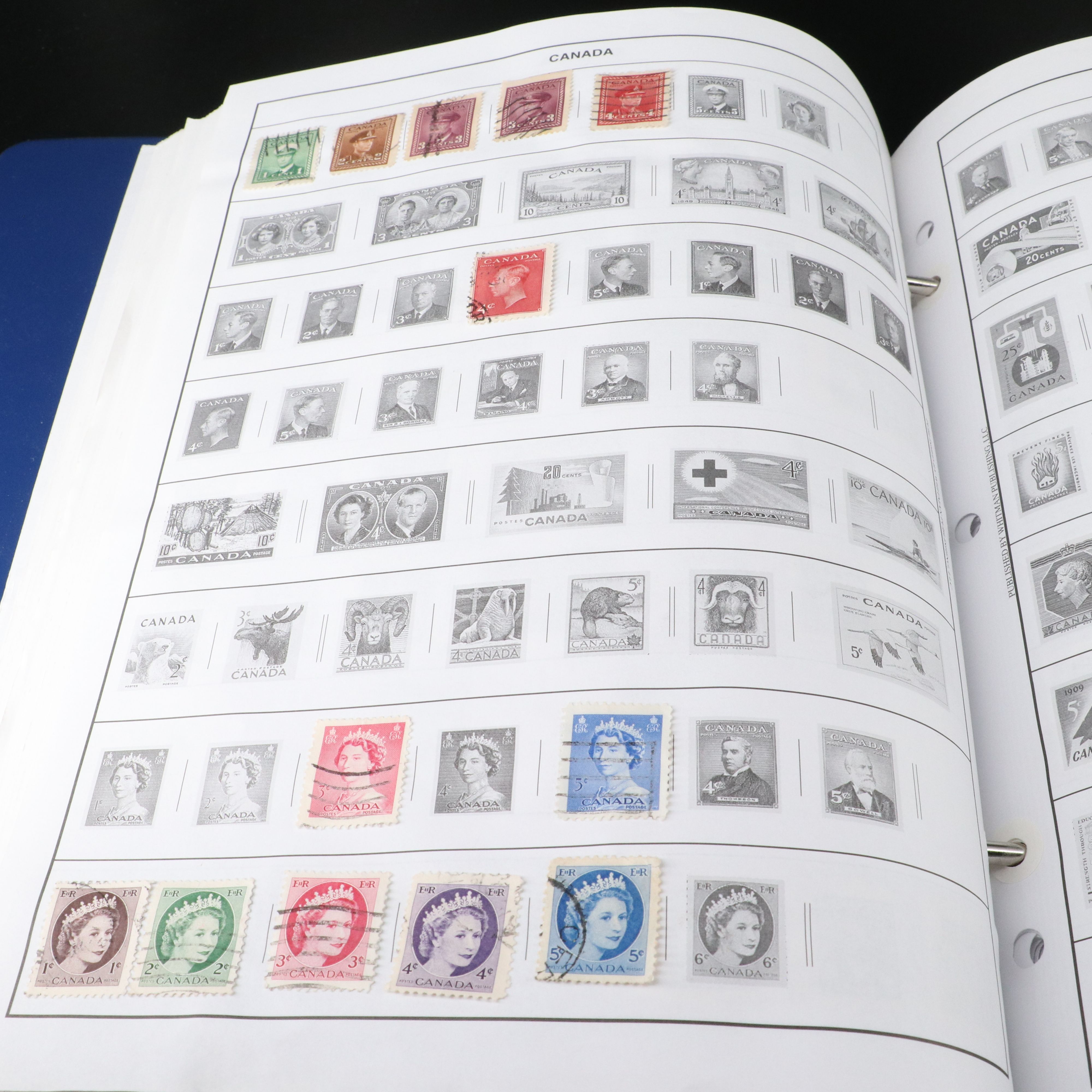 Two Harris "Statesman" World Stamp Albums Part 1 and Part 2.