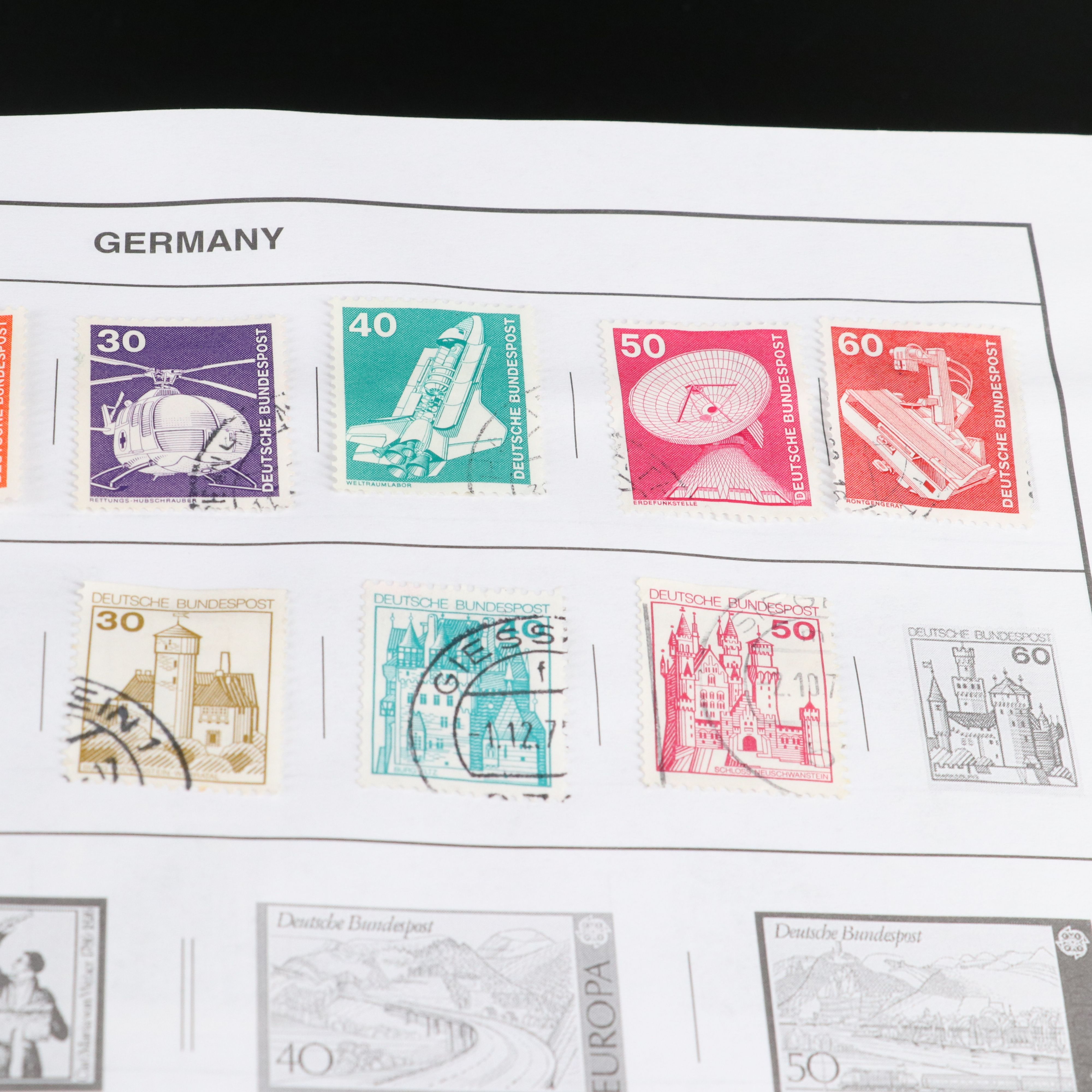 Two Harris "Statesman" World Stamp Albums Part 1 and Part 2.