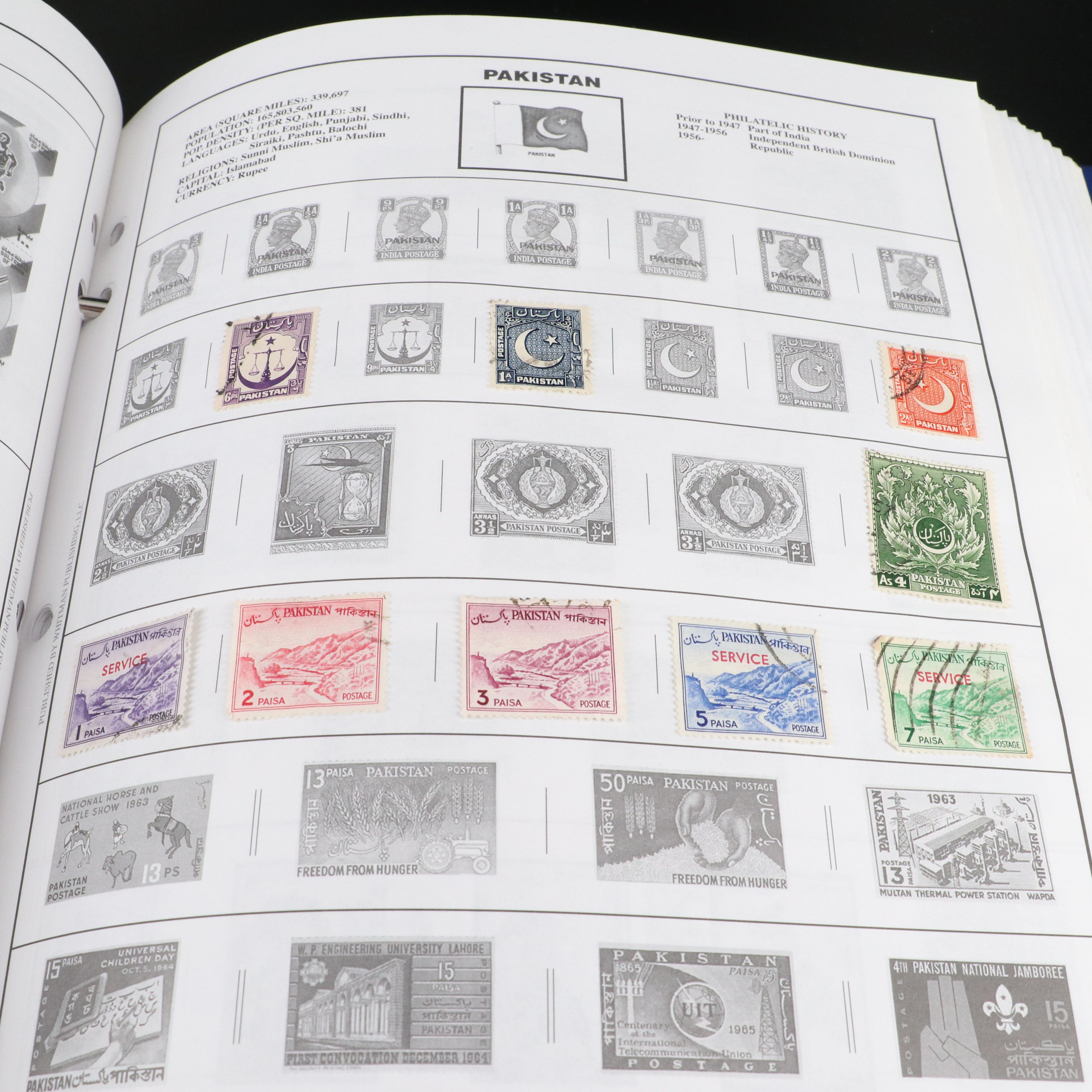 Two Harris "Statesman" World Stamp Albums Part 1 and Part 2.