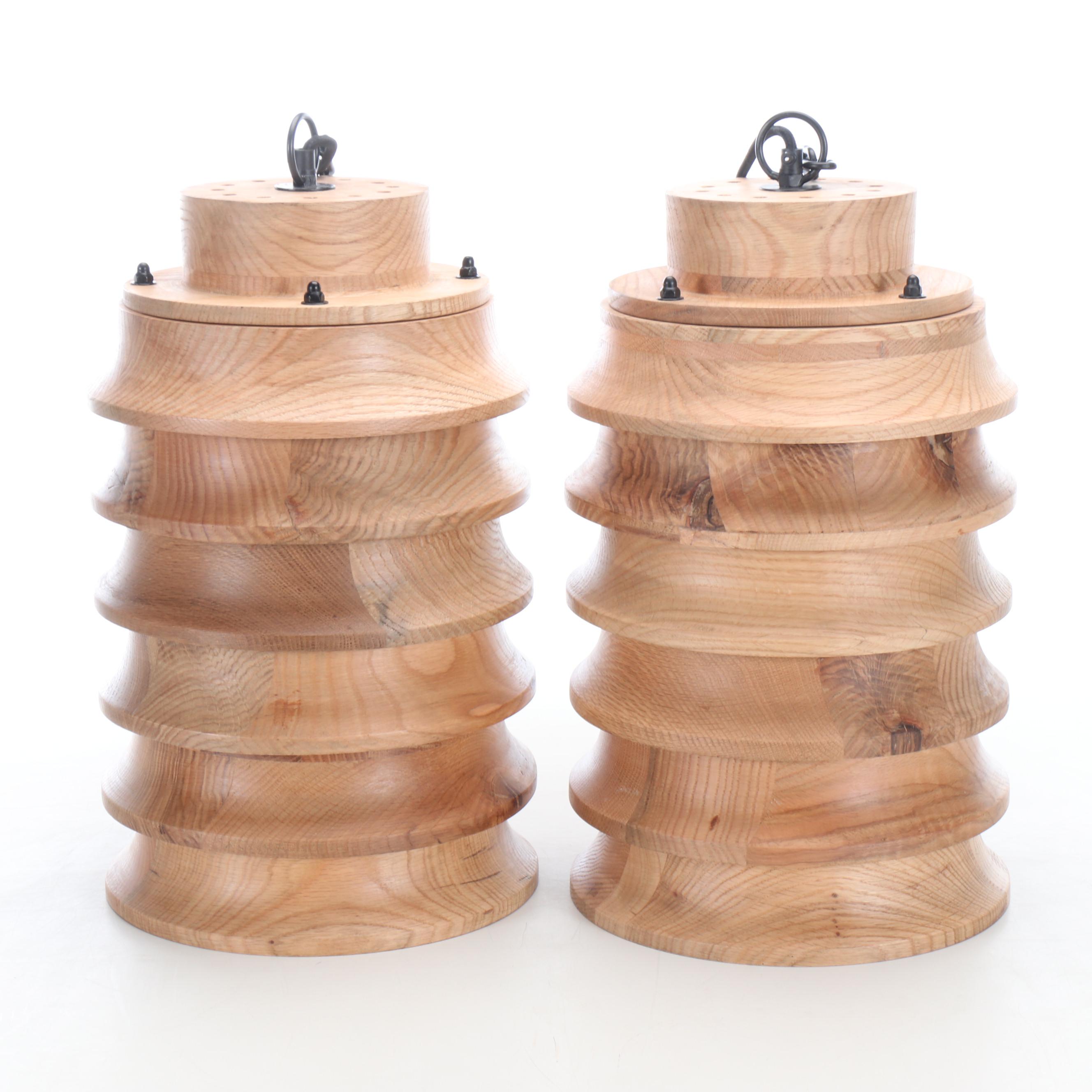 Pair of Bobo Carved Wood Stacked Ring Pendant Lights
