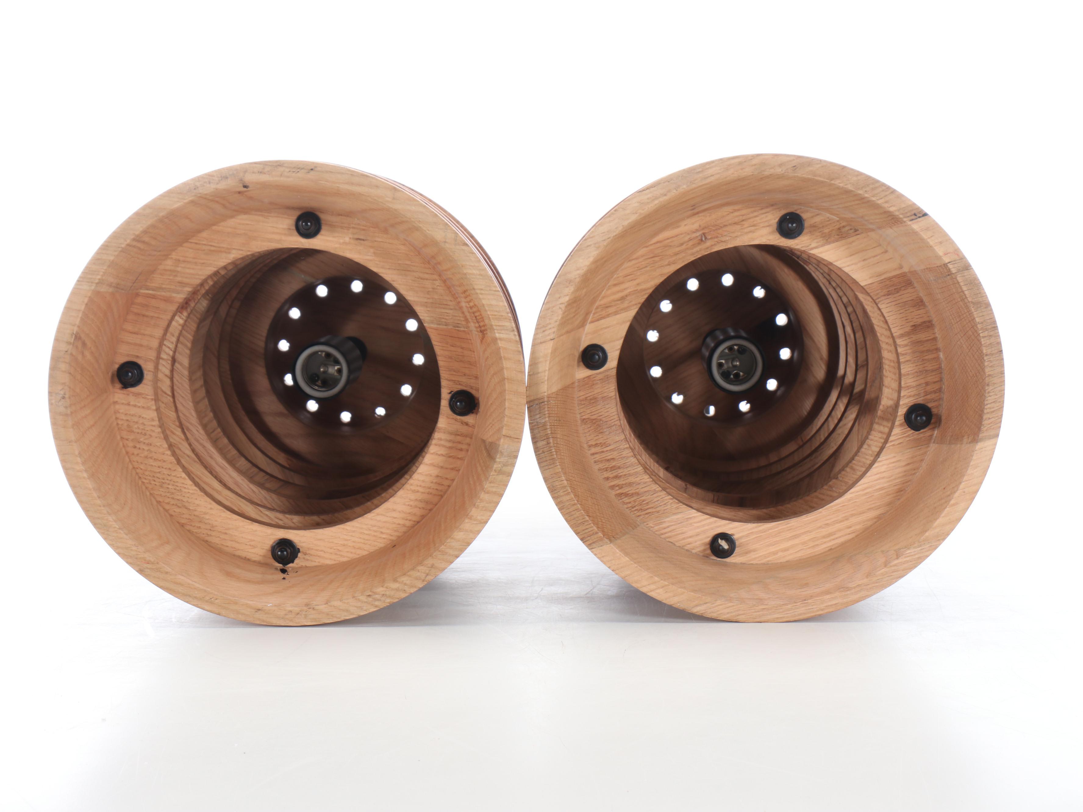 Pair of Bobo Carved Wood Stacked Ring Pendant Lights