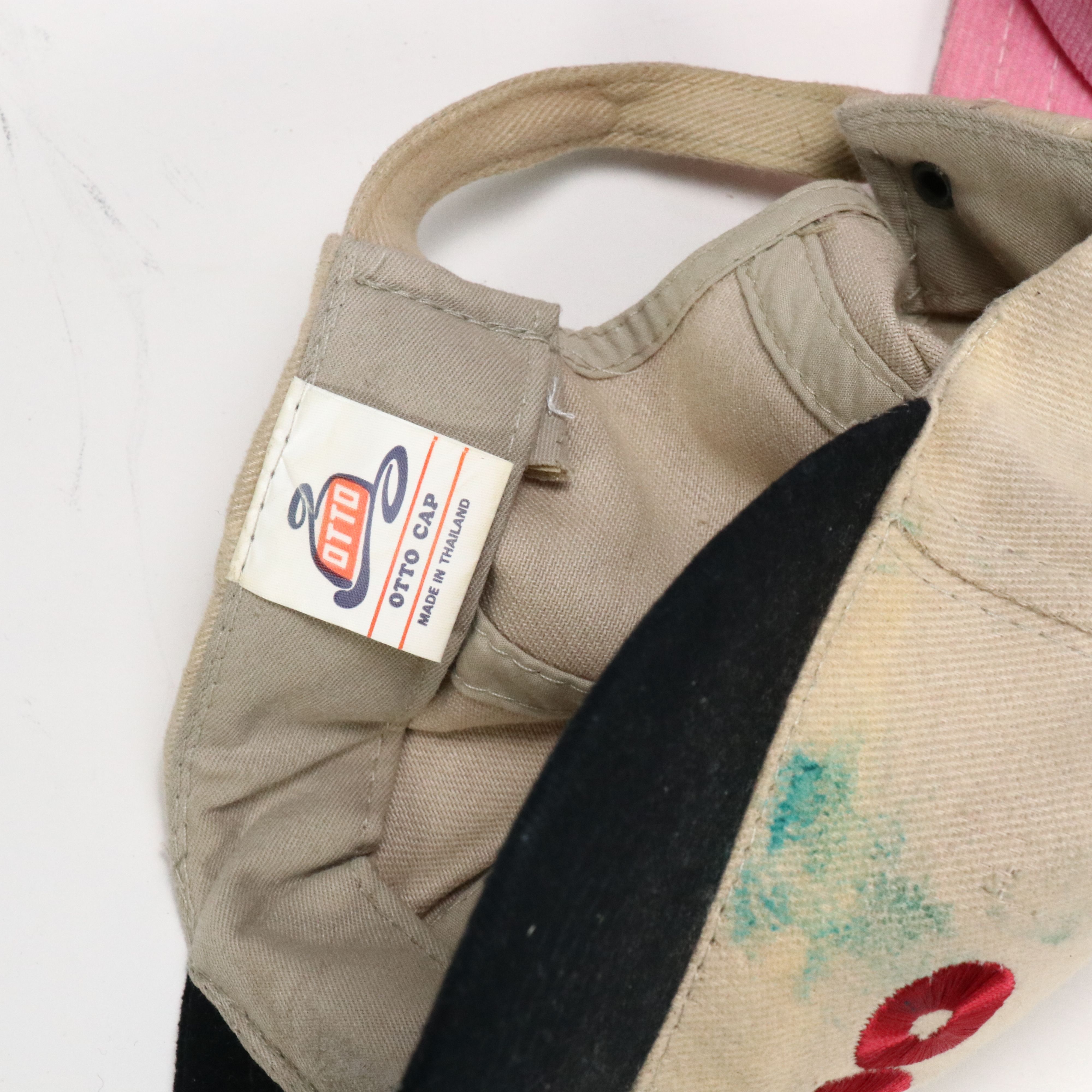 Assorted Baseball Caps and Wooden Display Featuring Marlboro, NASCAR