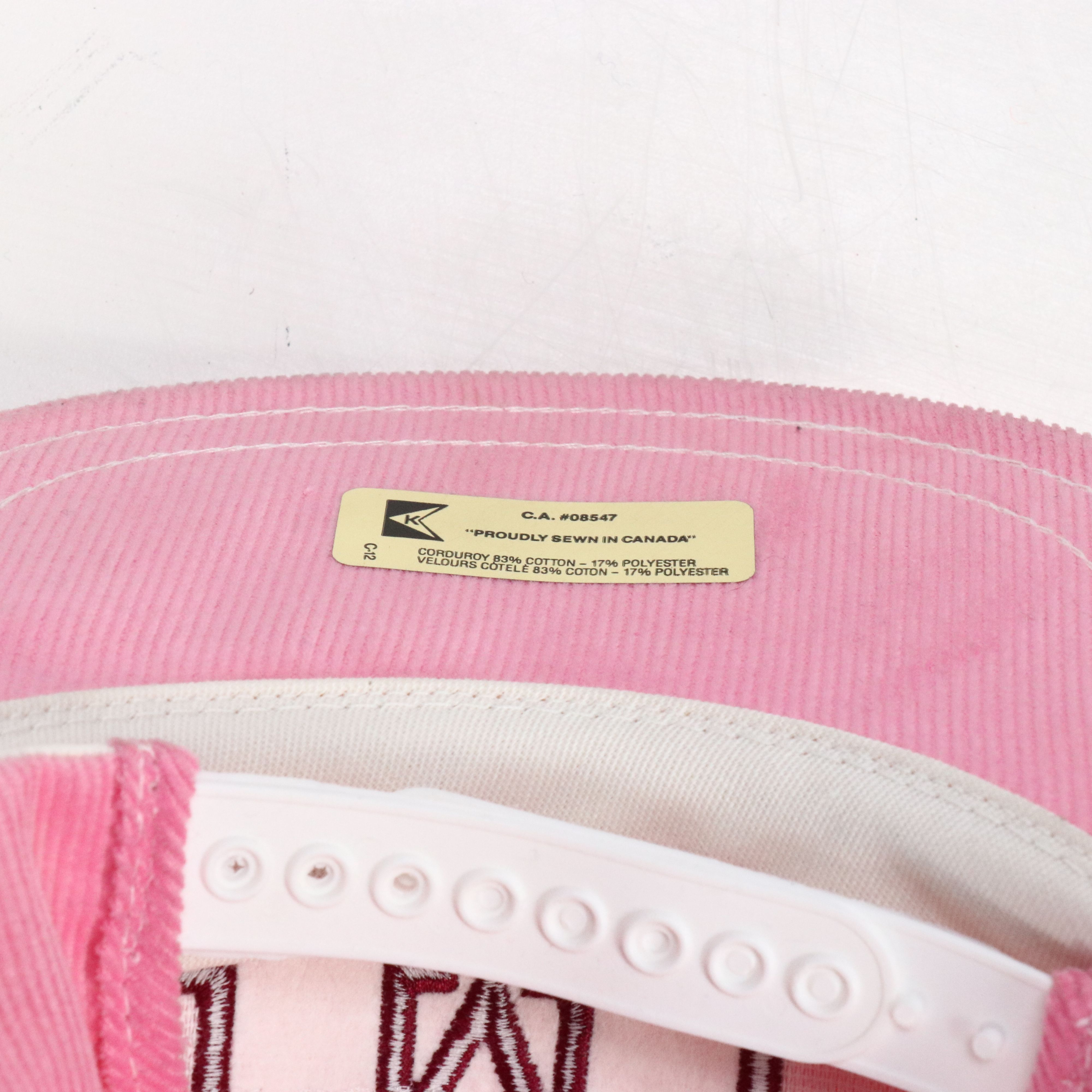 Assorted Baseball Caps and Wooden Display Featuring Marlboro, NASCAR