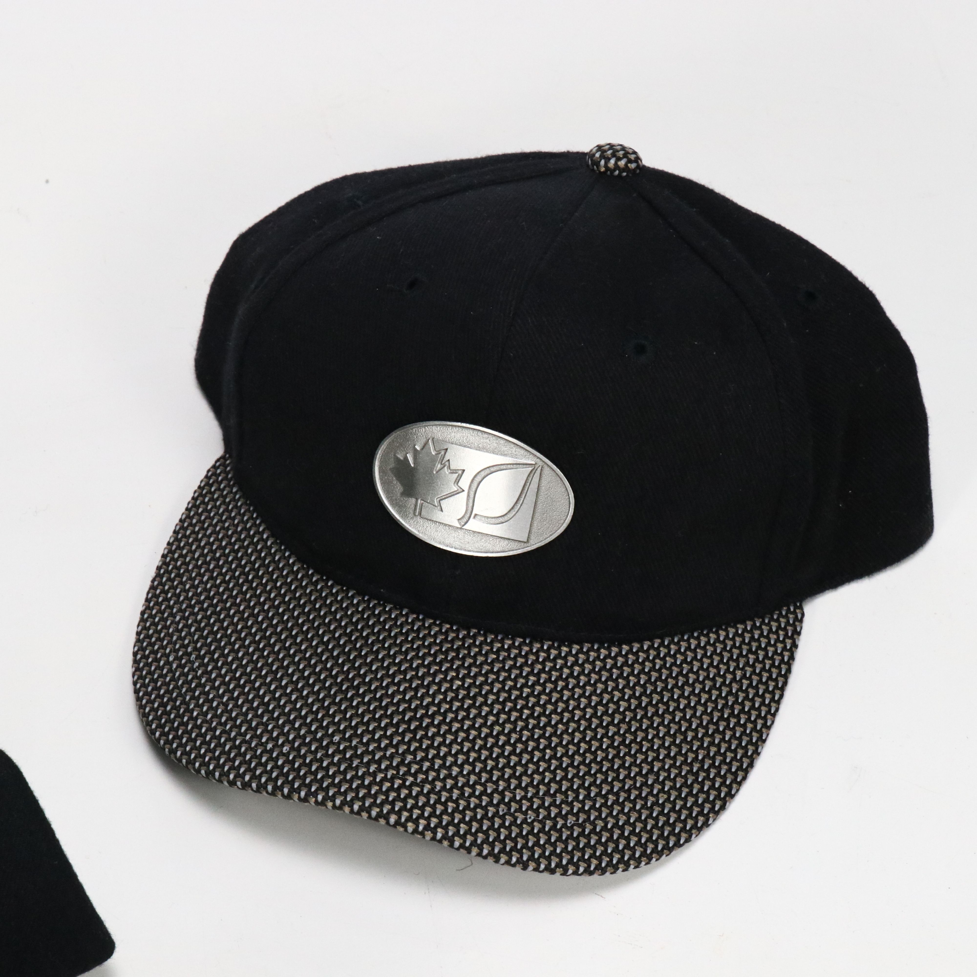 Assorted Baseball Caps and Wooden Display Featuring Marlboro, NASCAR