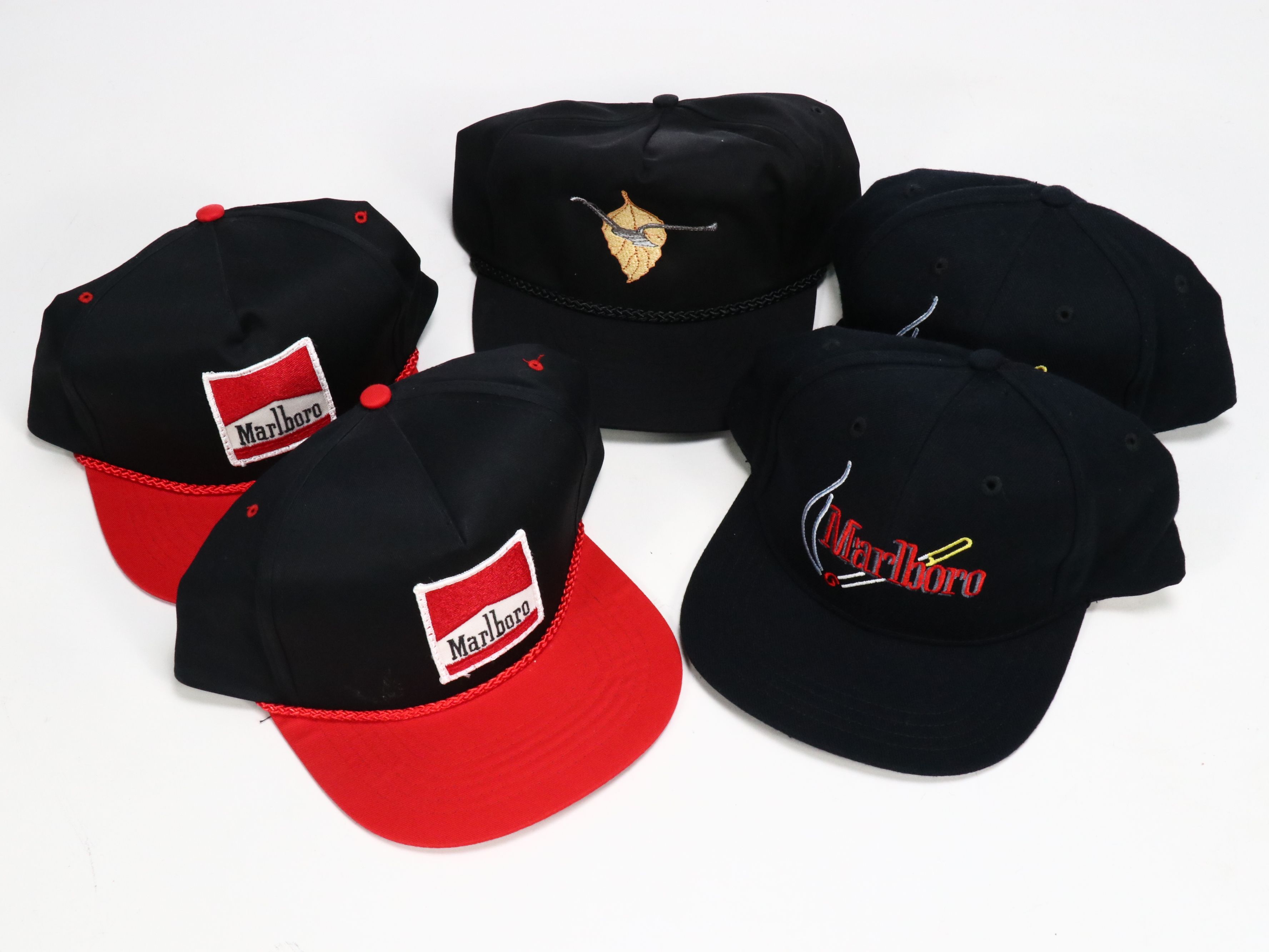 Assorted Baseball Caps and Wooden Display Featuring Marlboro, NASCAR