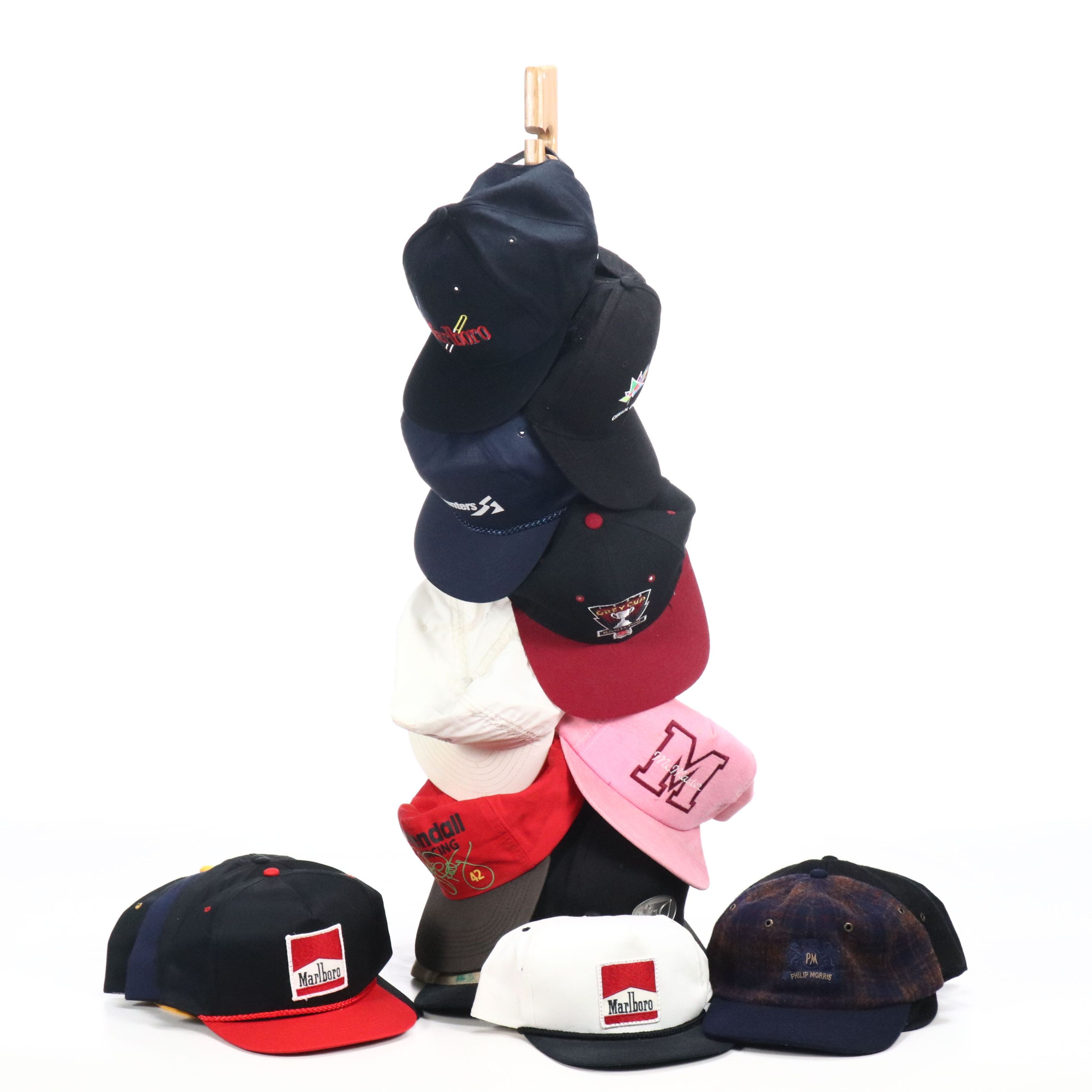 Assorted Baseball Caps and Wooden Display Featuring Marlboro, NASCAR