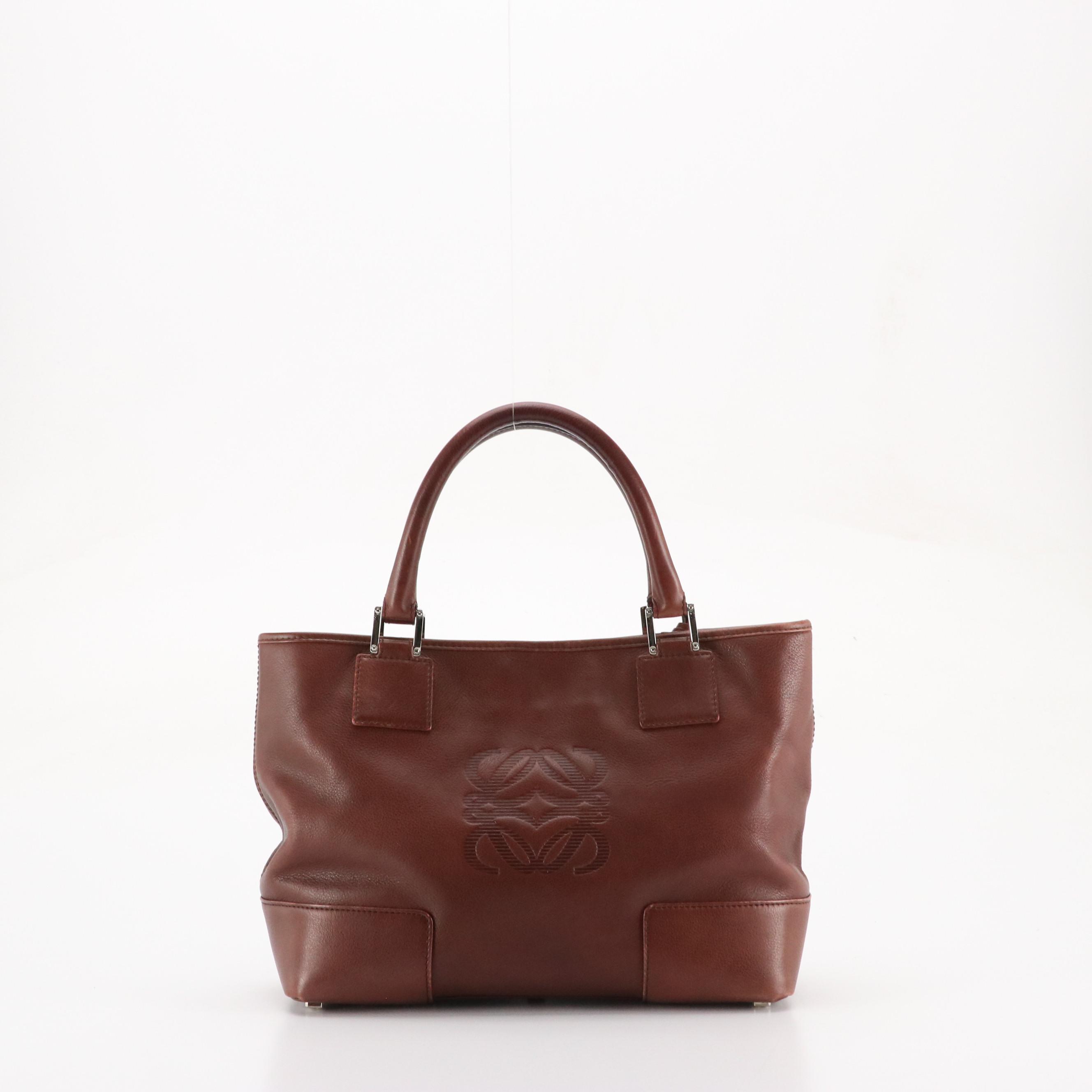 Loewe Anagram Embossed Handbag in Brown Leather