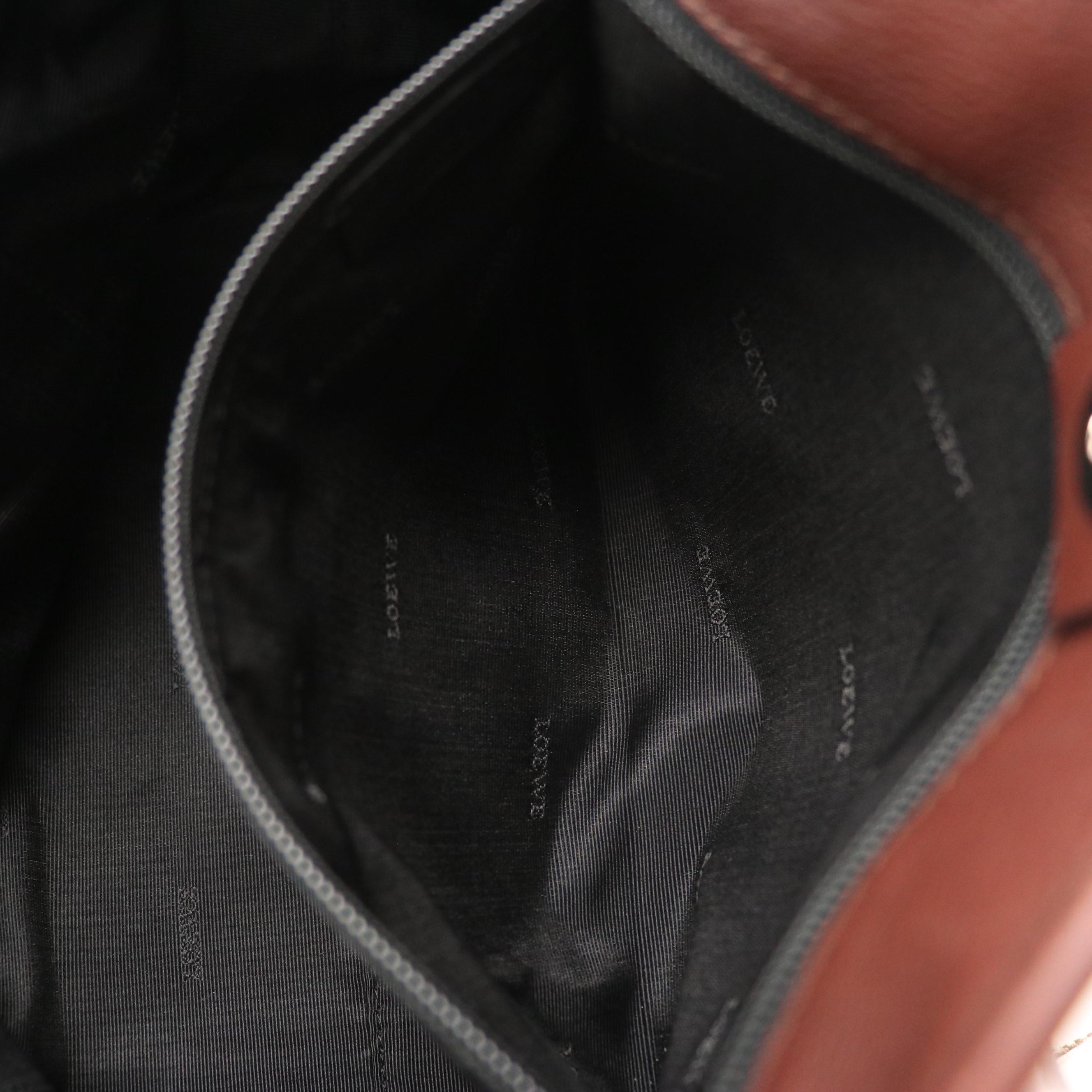 Loewe Anagram Embossed Handbag in Brown Leather