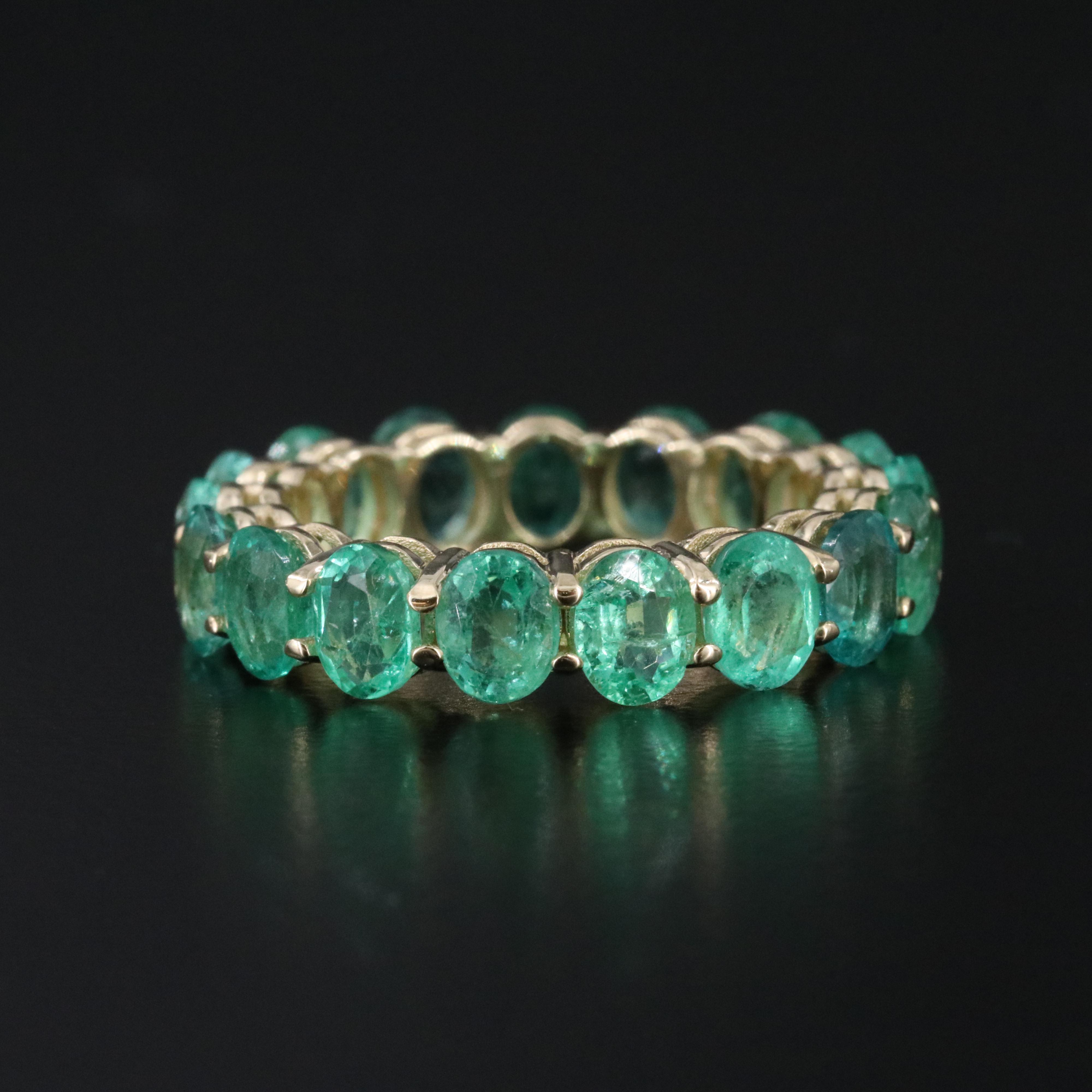 14K 6.32 CTW Emerald Eternity Band with IGI Jewelry Report
