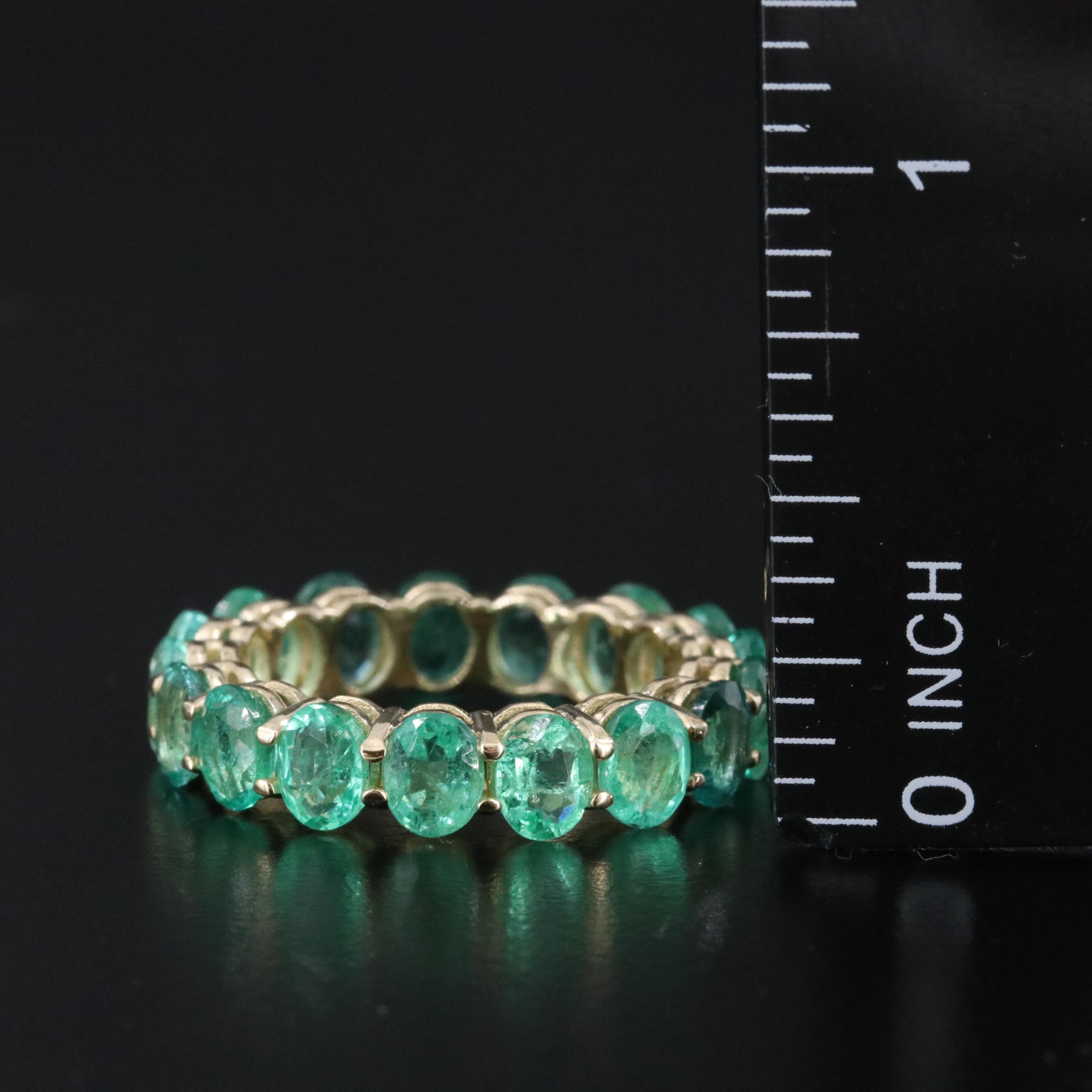 14K 6.32 CTW Emerald Eternity Band with IGI Jewelry Report