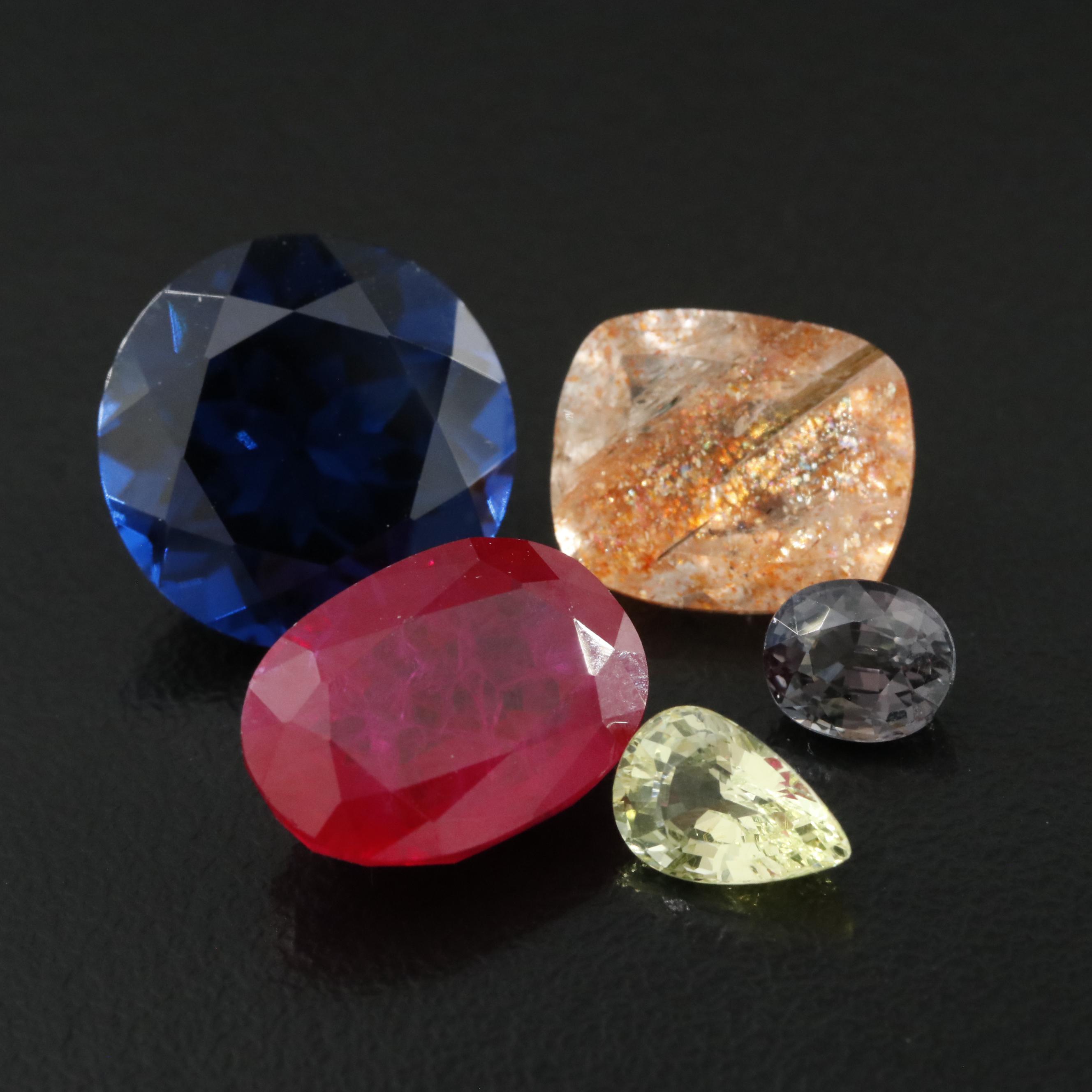 Loose 28.62 CTW Gemstones Including Sunstone and Lab Grown Ruby