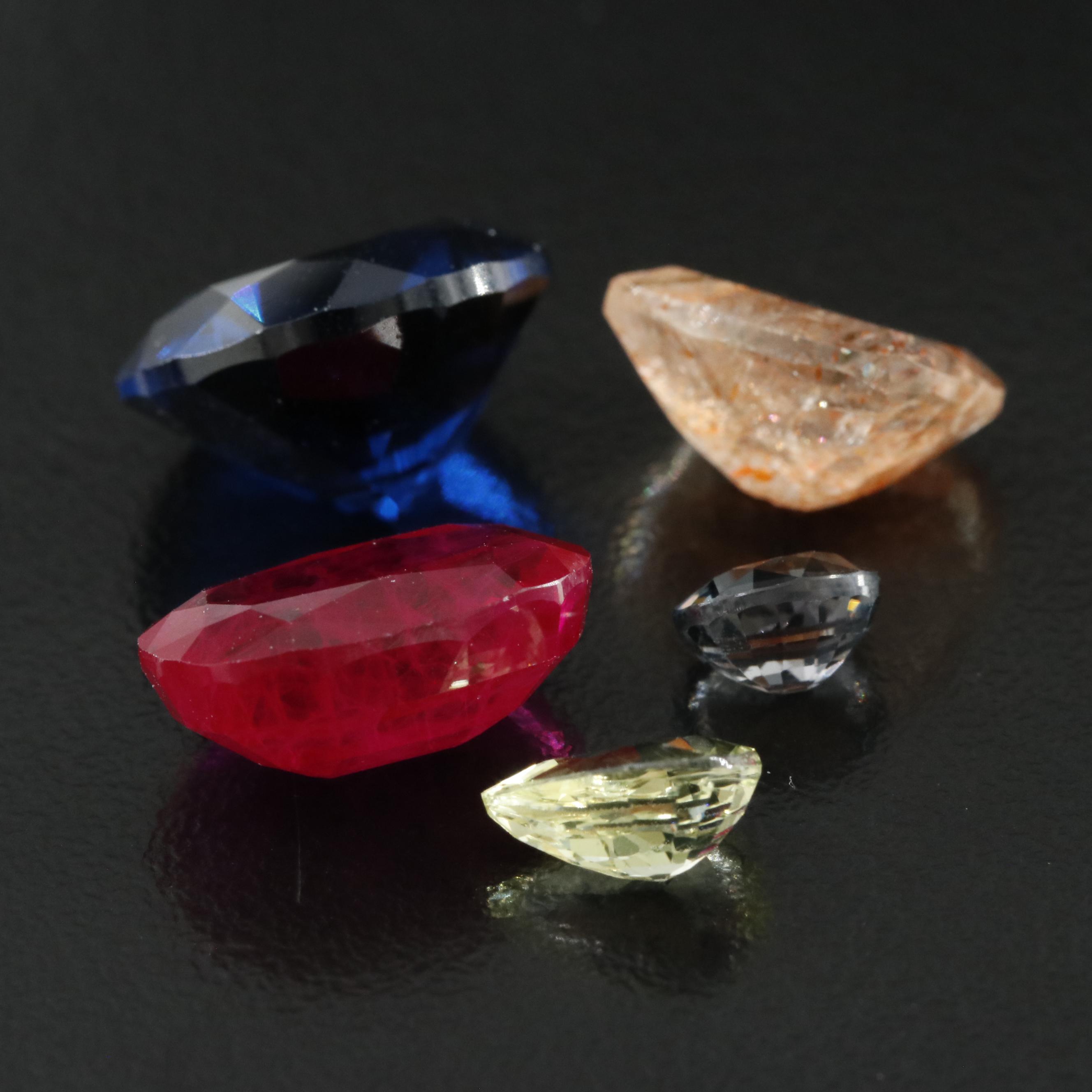 Loose 28.62 CTW Gemstones Including Sunstone and Lab Grown Ruby