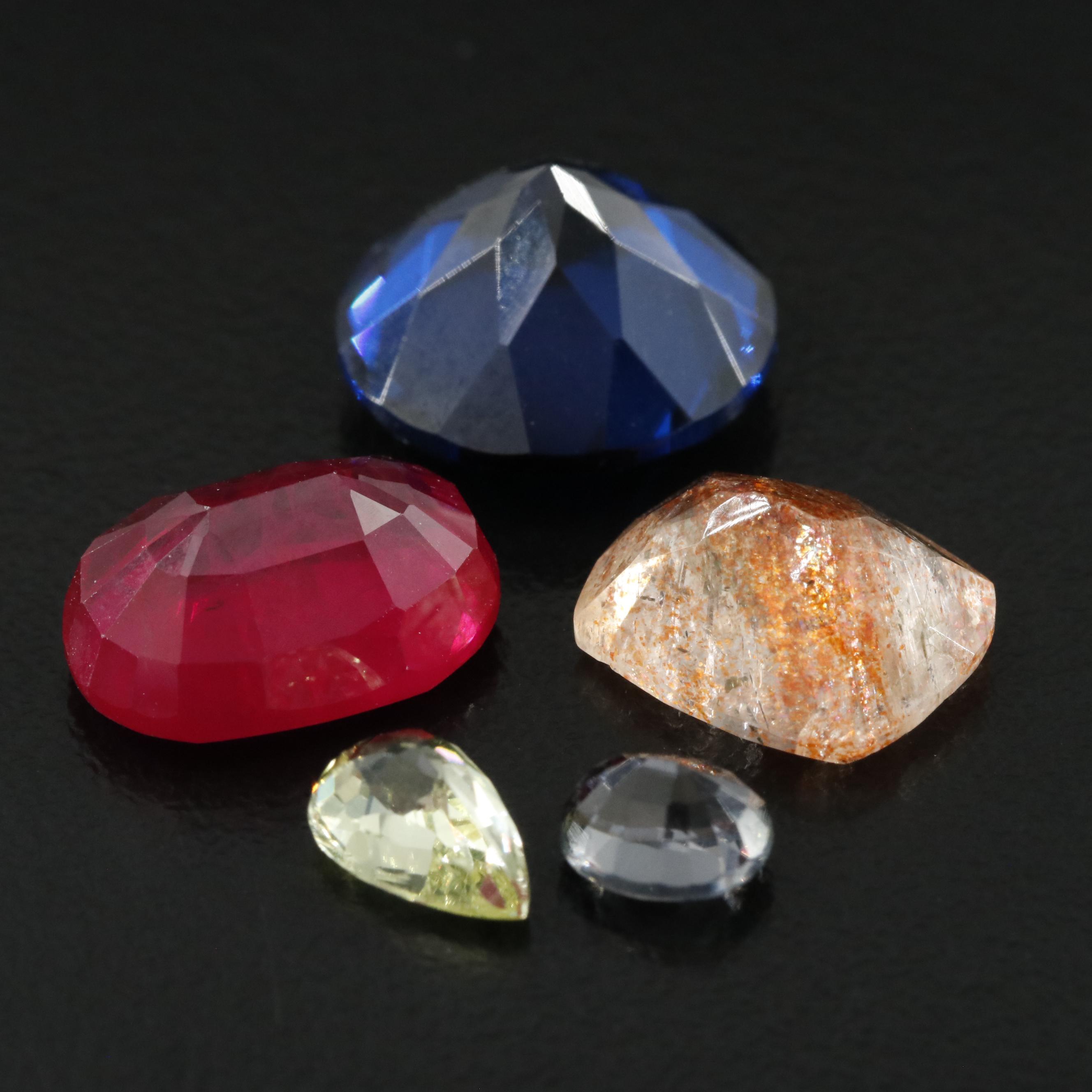 Loose 28.62 CTW Gemstones Including Sunstone and Lab Grown Ruby