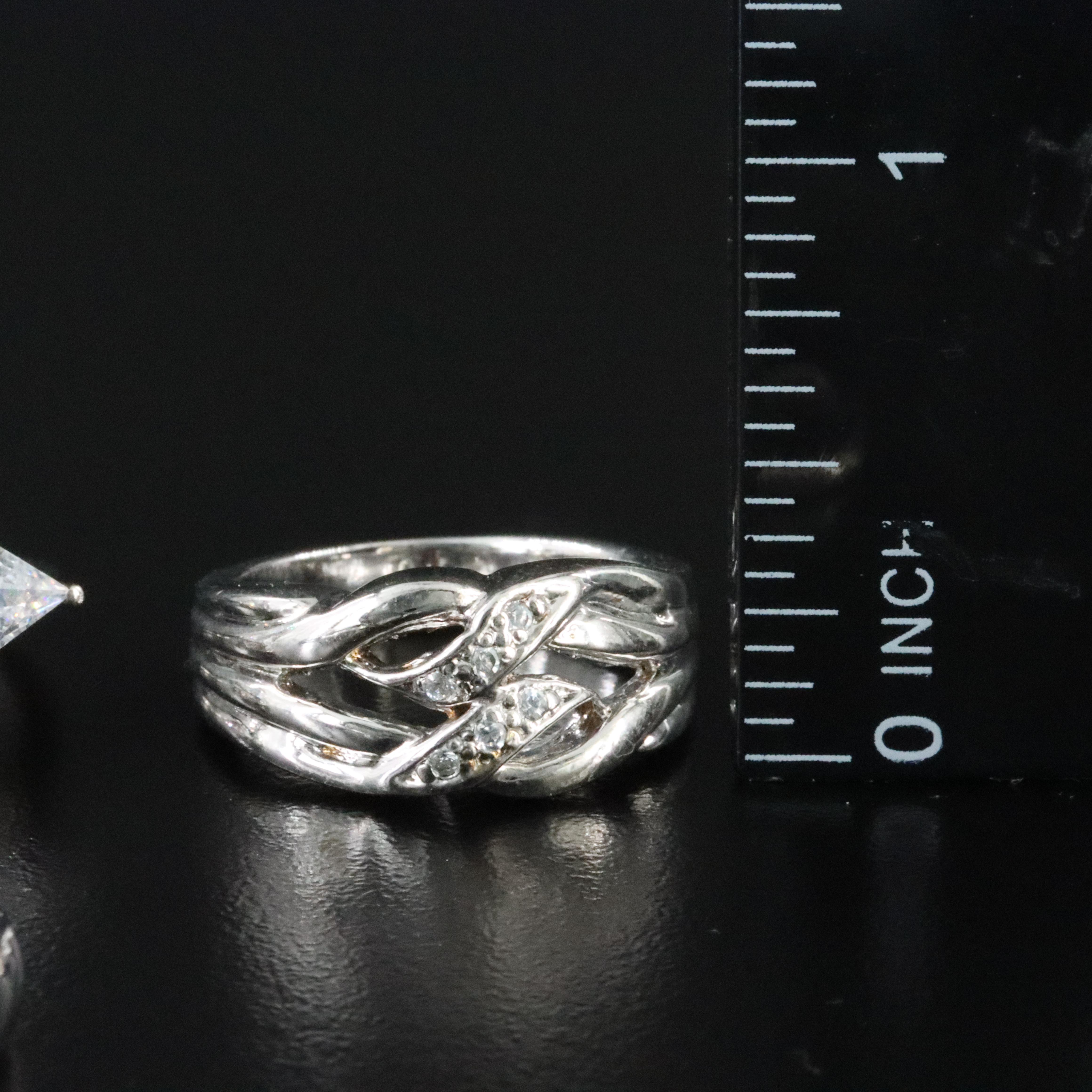 Topaz, CZ and Diamonds Featured in Sterling Ring Selection