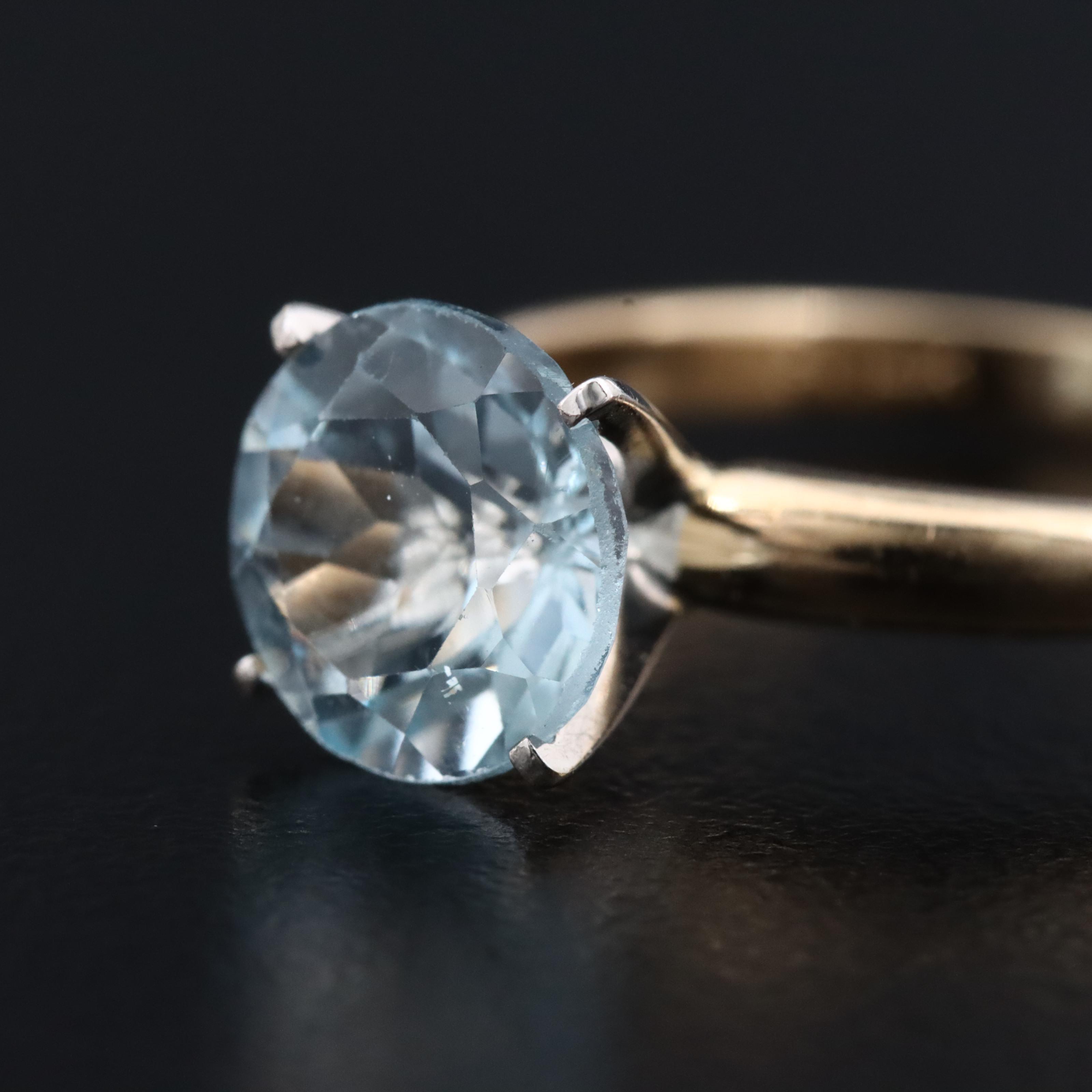 14K Blue Topaz Solitaire Ring