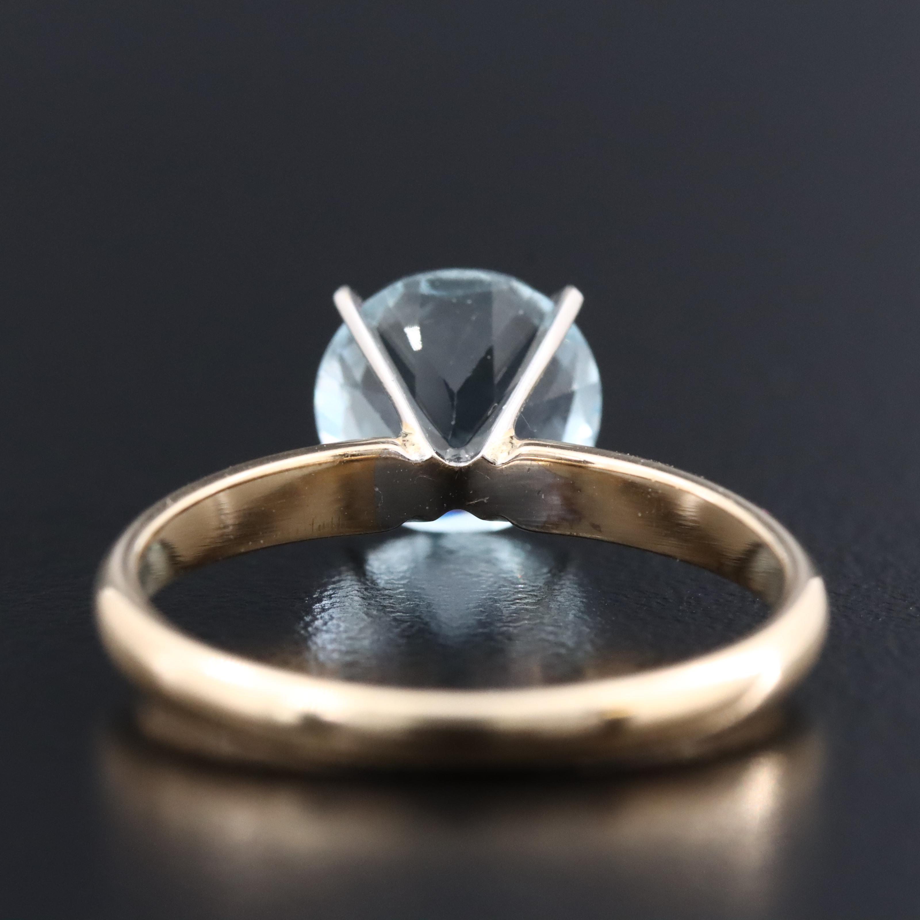 14K Blue Topaz Solitaire Ring
