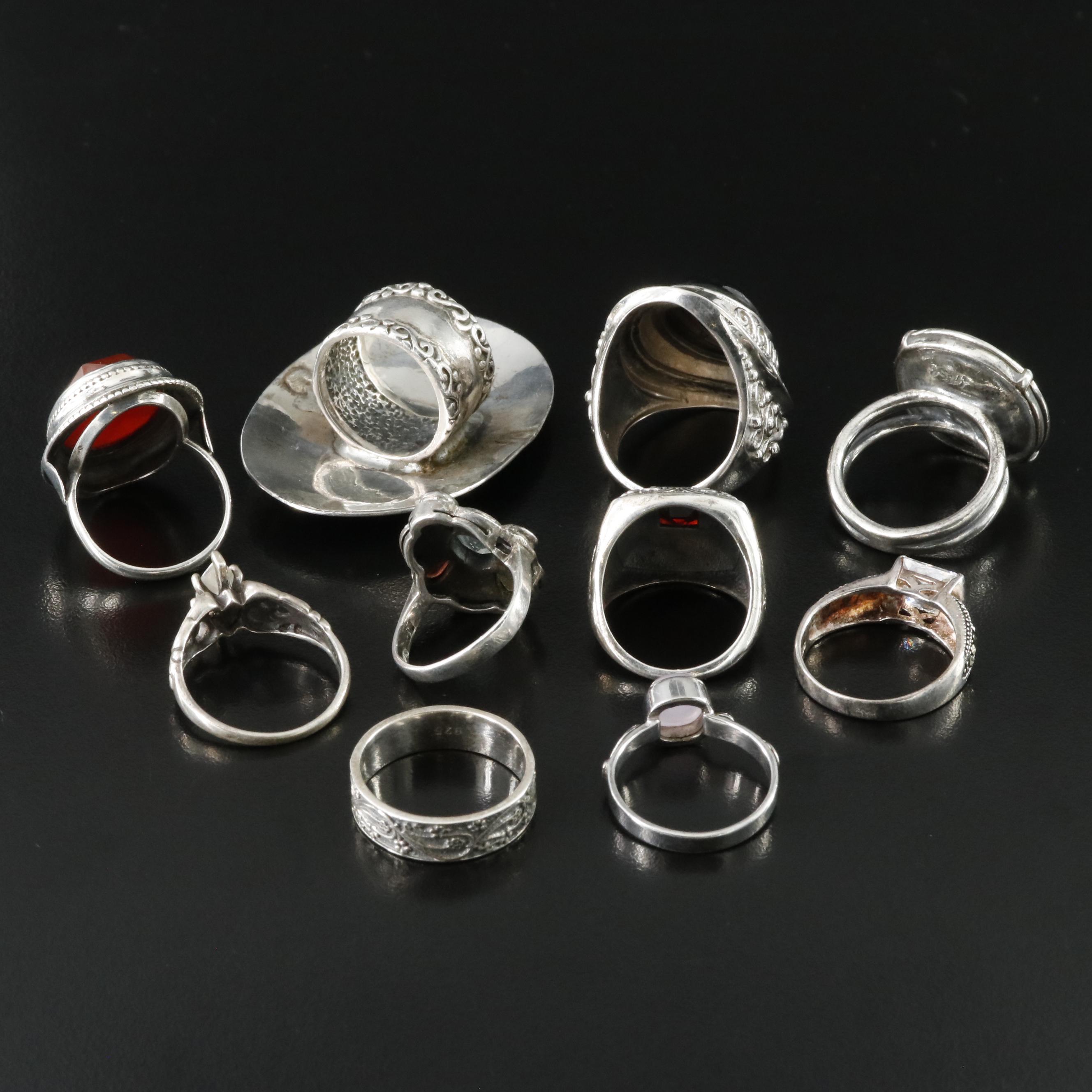 Sterling and 835 Silver Ring Collection Including Carnelian and Garnet