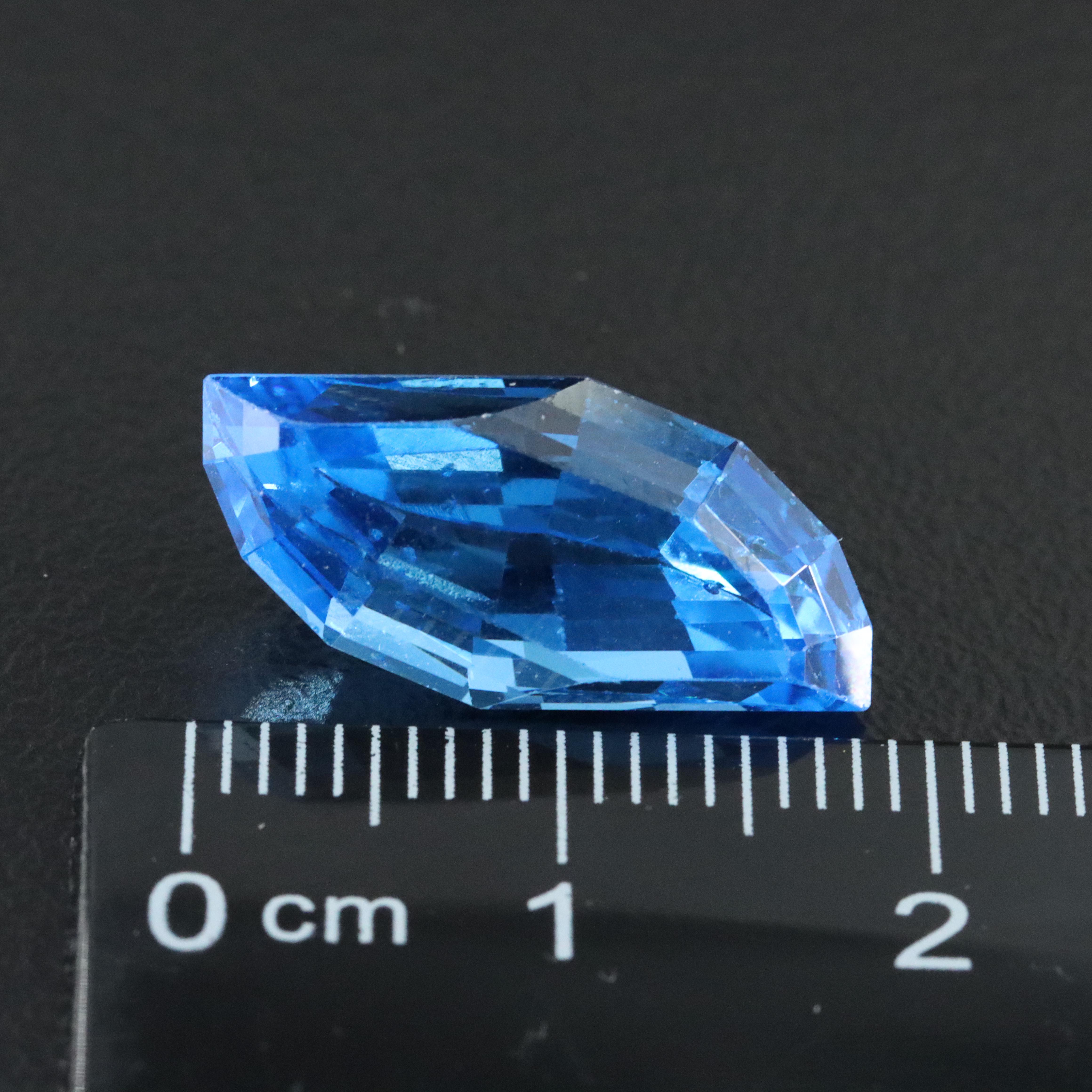 Loose Mixed Gemstone Lot Including Opal, Onyx, and Lab Grown Ruby