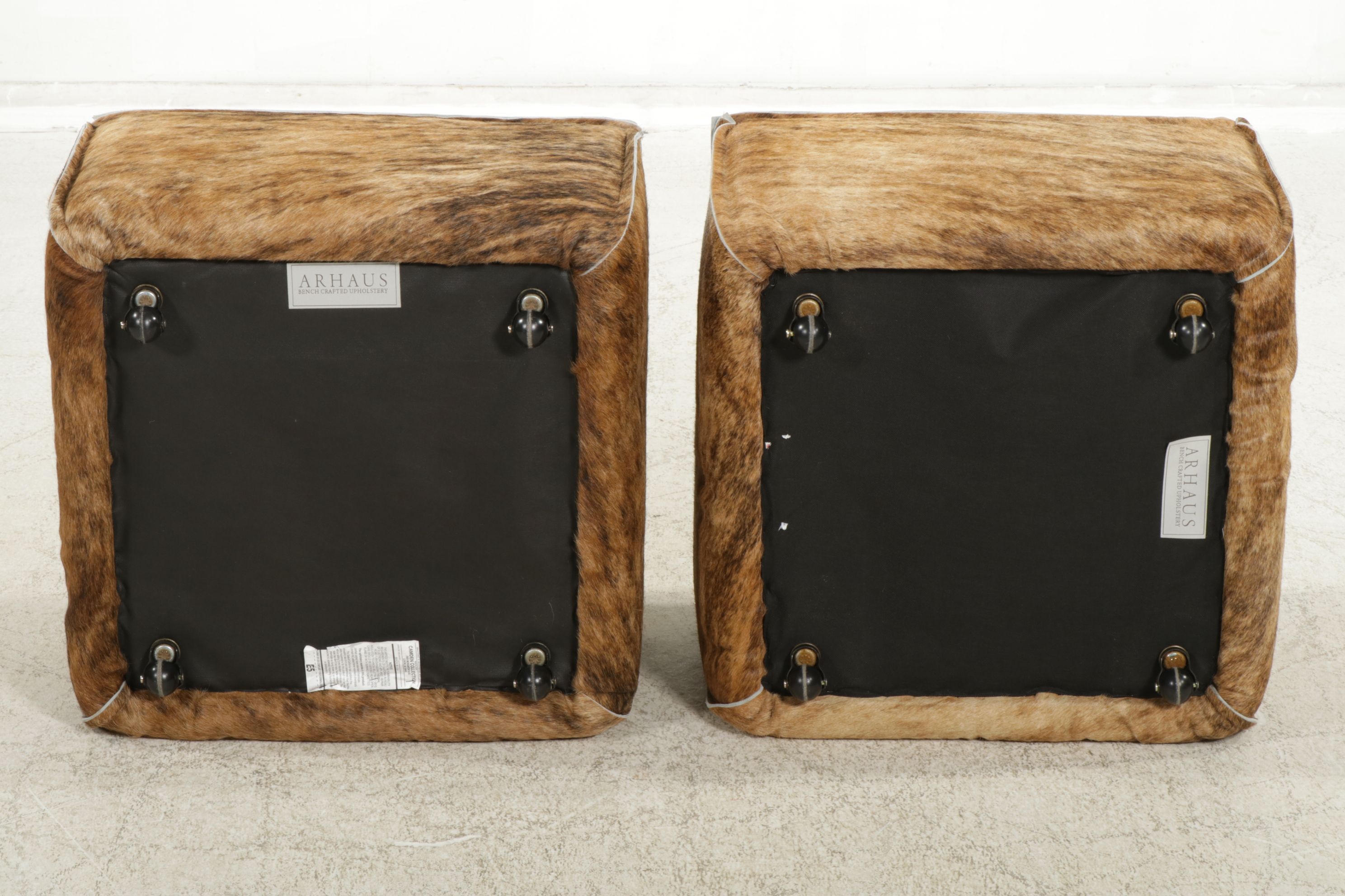 Pair of Arhaus Cowhide Upholstered Footstools
