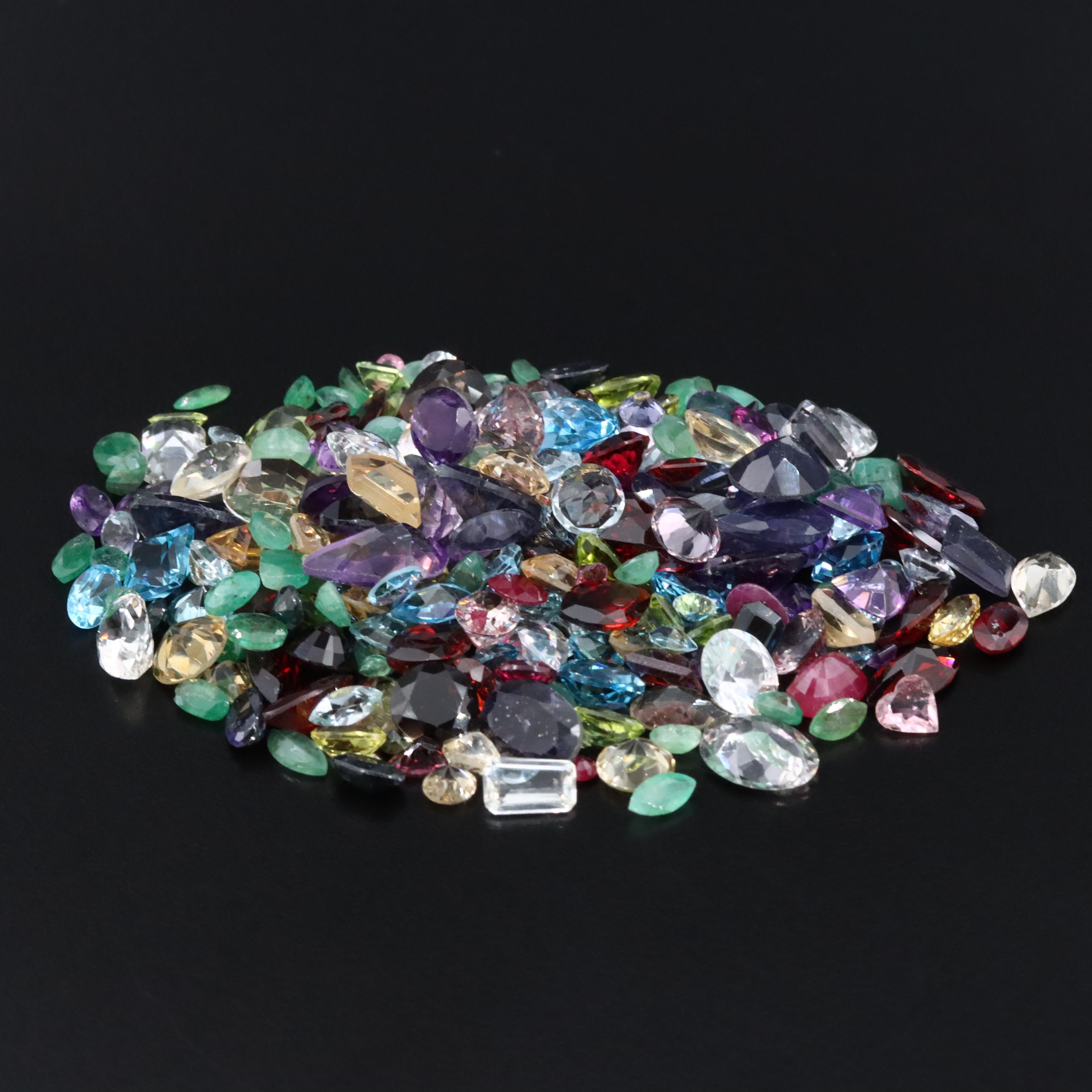 Loose 156.54 CTW Mixed Gemstone Lot Including Emerald, Amethyst and Garnet