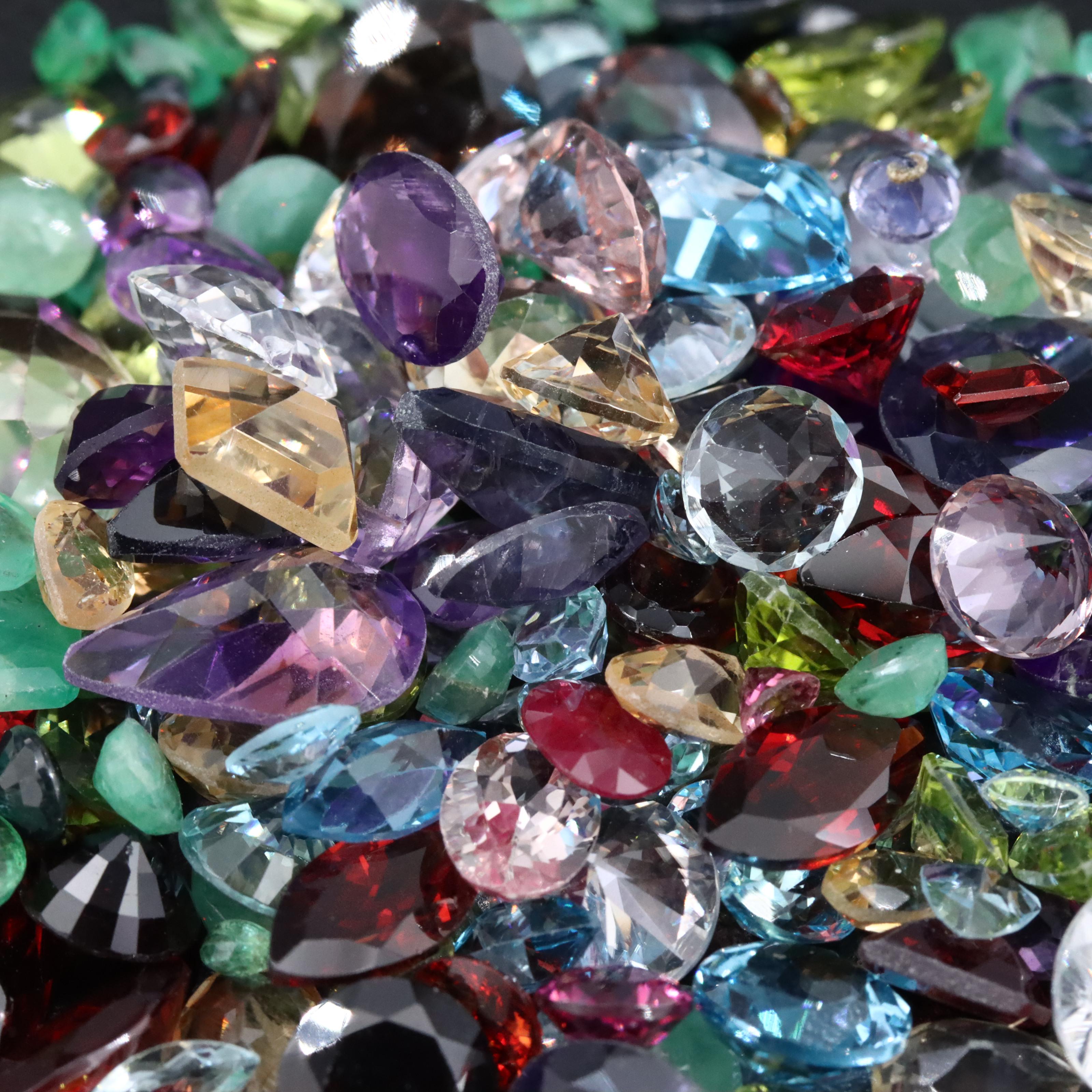 Loose 156.54 CTW Mixed Gemstone Lot Including Emerald, Amethyst and Garnet