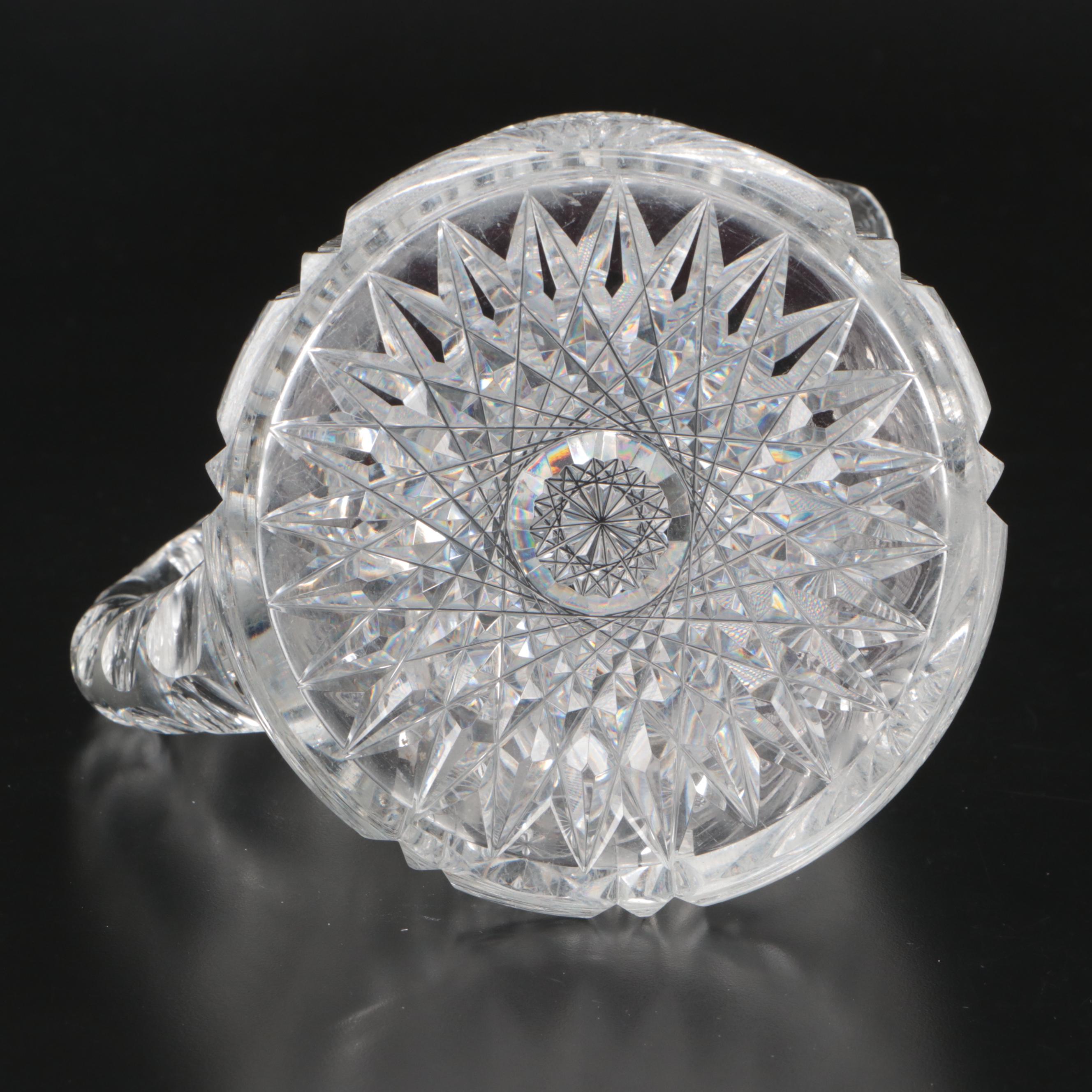 American Brilliant Cut Glass Cylindrical Vase and Sawtooth Rim Pitcher, 20th C.