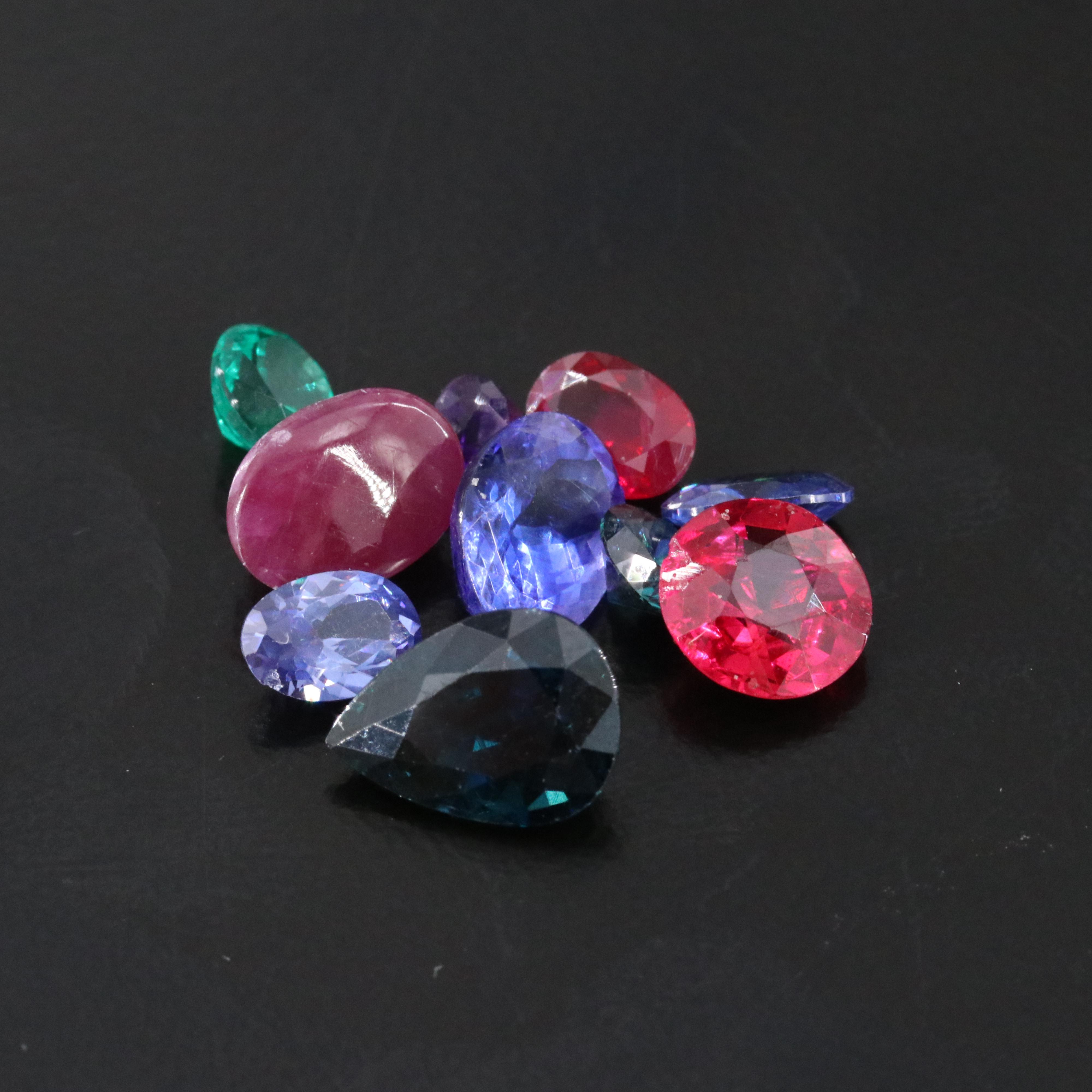 Loose 9.61 CTW Lab Grown Ruby, Lab Grown Emerald and Amethyst Lot