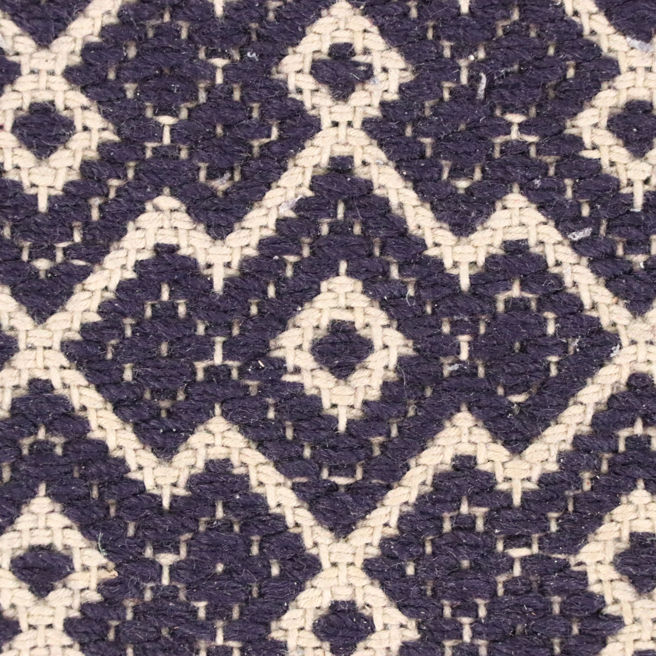 Navy Blue and White Geometric 4' x 7' Woven Tasseled Accent Rug