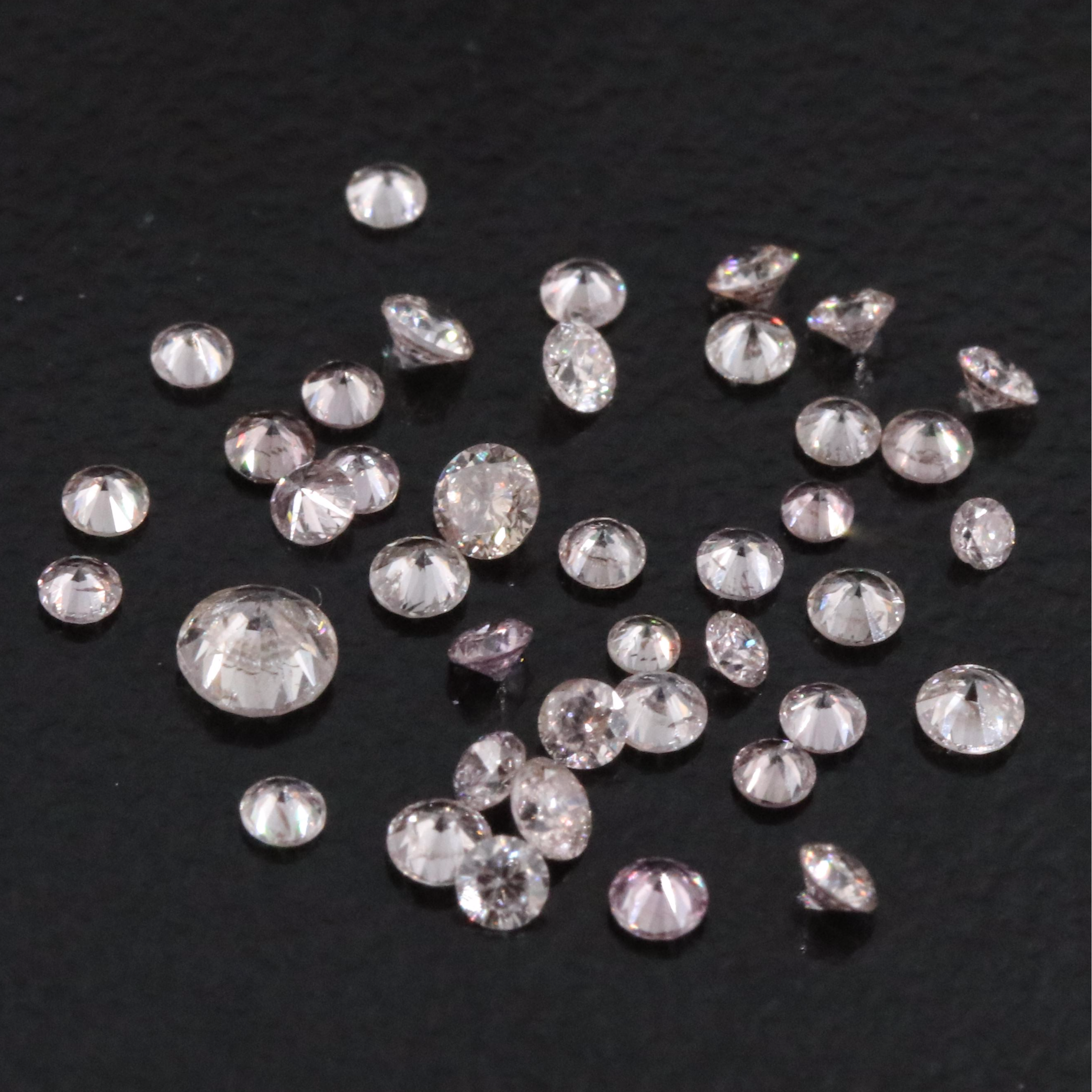 Loose 0.99 CTW Diamond Lot Including Fancy Pink