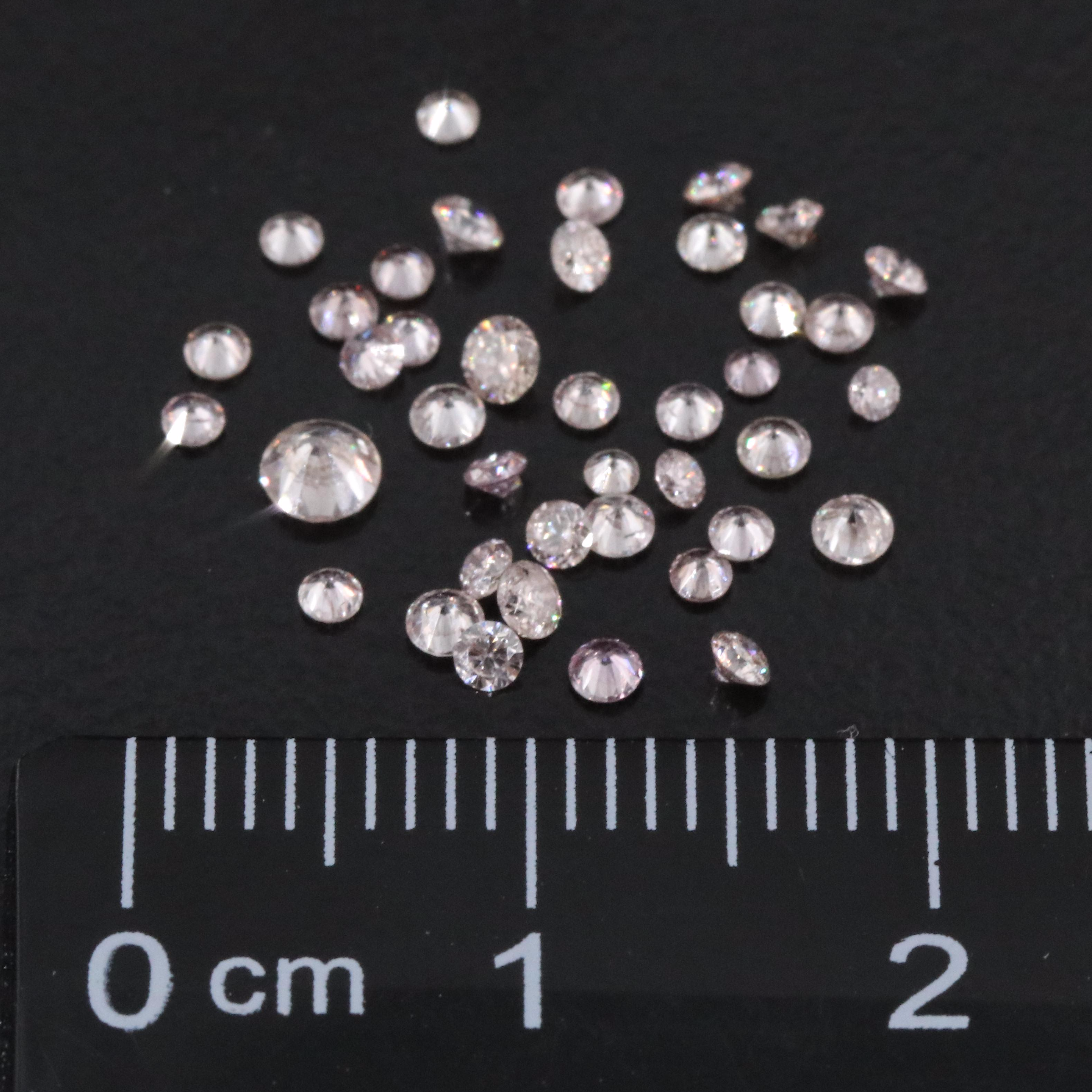 Loose 0.99 CTW Diamond Lot Including Fancy Pink