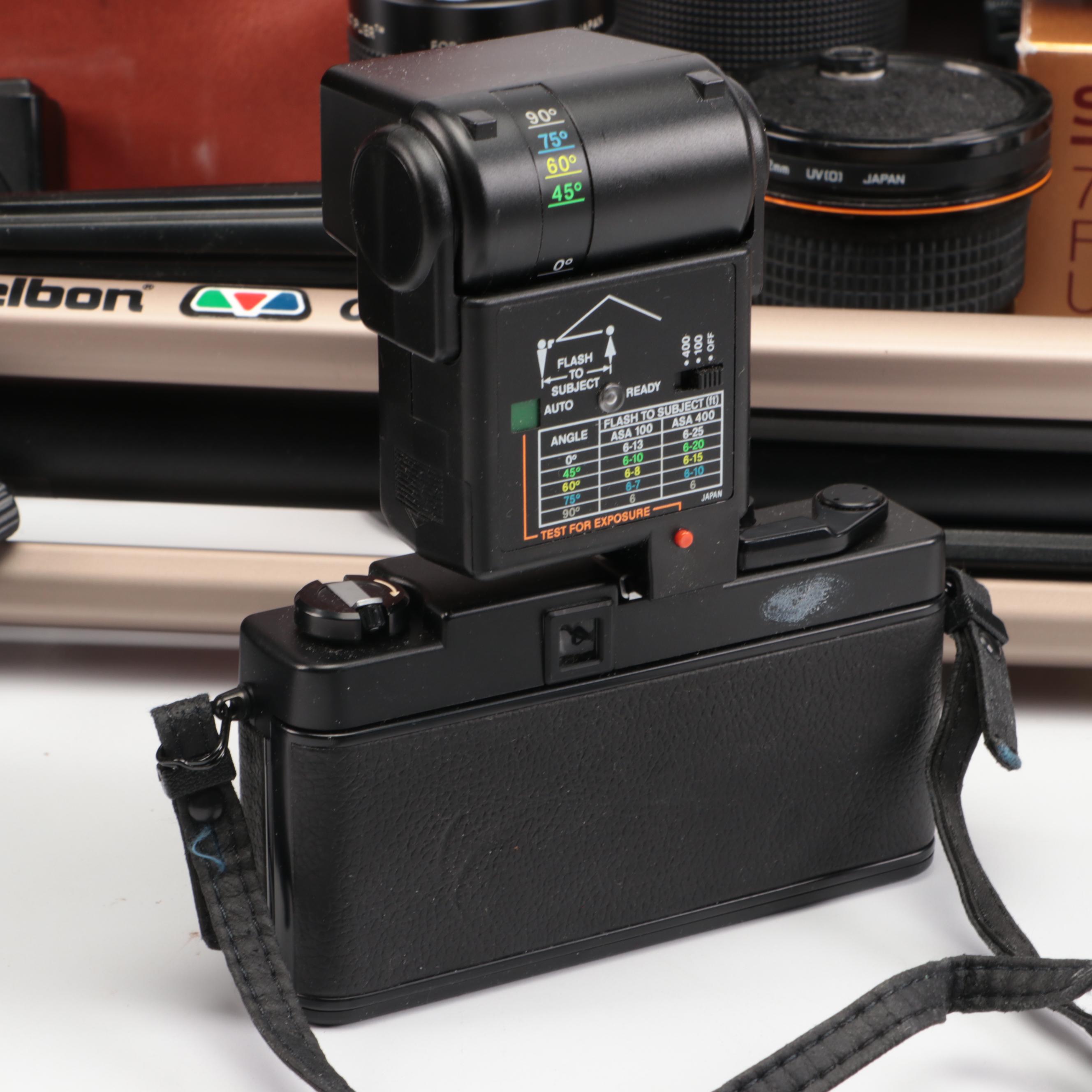 Nikon FE with MD-12 Motor Drive with Other Camera and Accessories