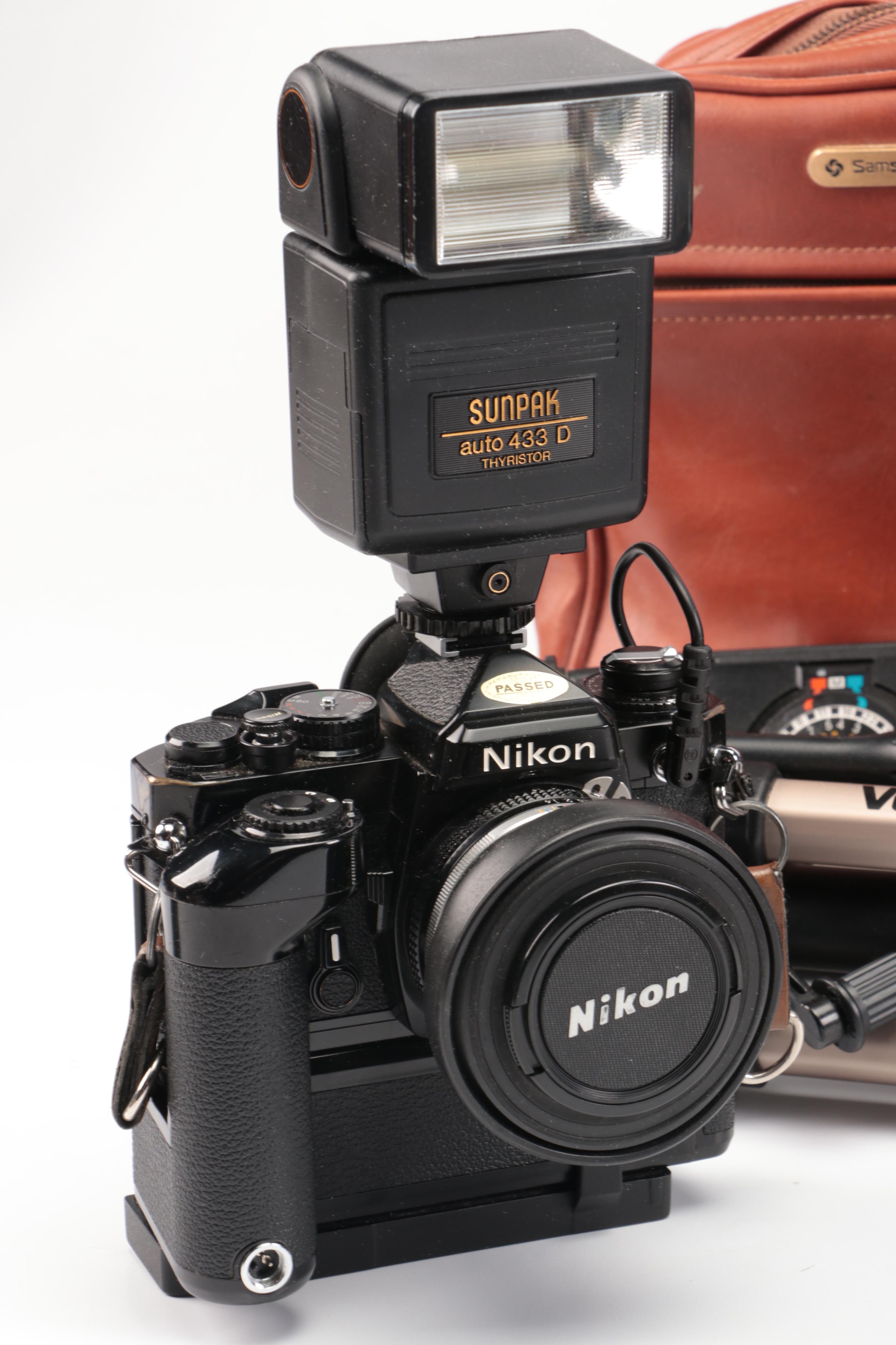 Nikon FE with MD-12 Motor Drive with Other Camera and Accessories