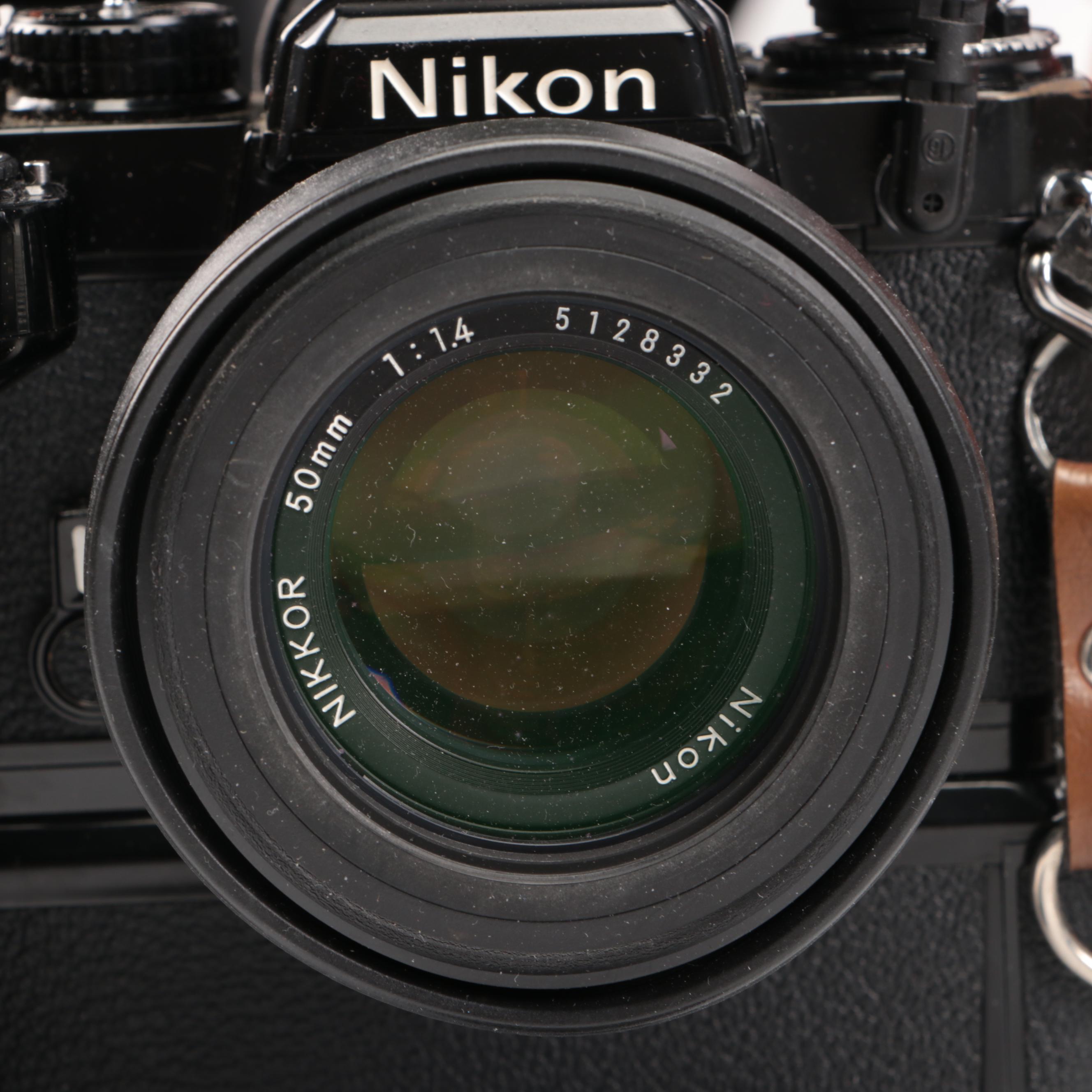 Nikon FE with MD-12 Motor Drive with Other Camera and Accessories