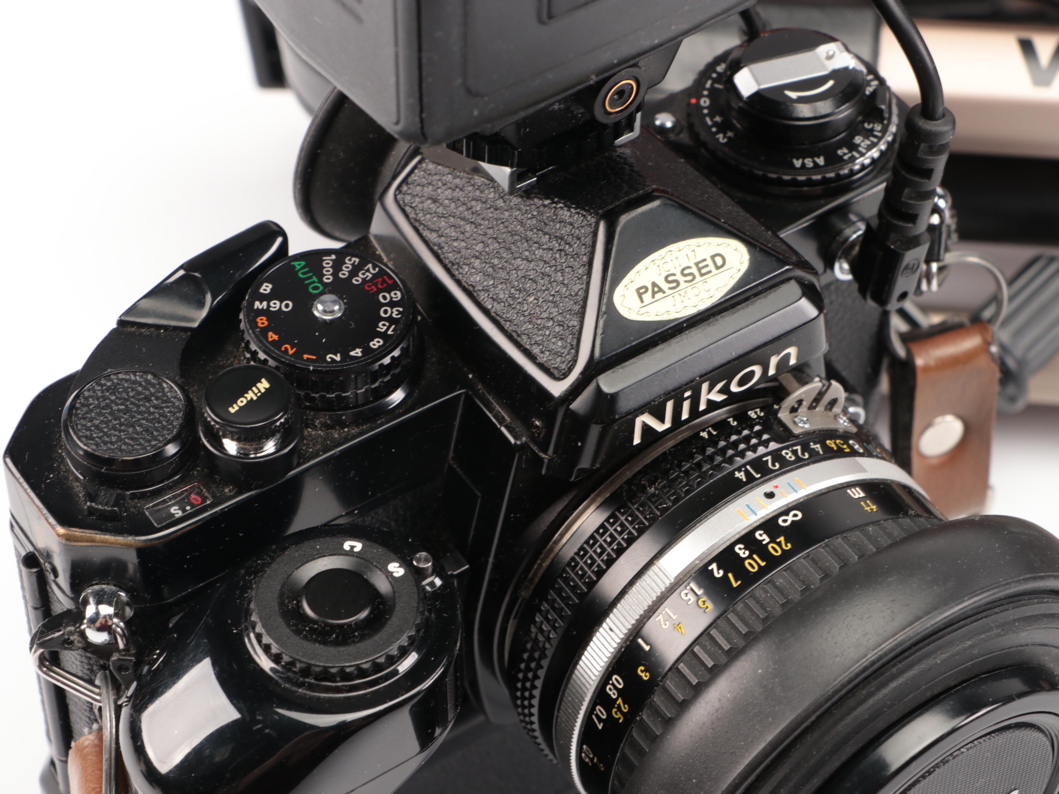 Nikon FE with MD-12 Motor Drive with Other Camera and Accessories