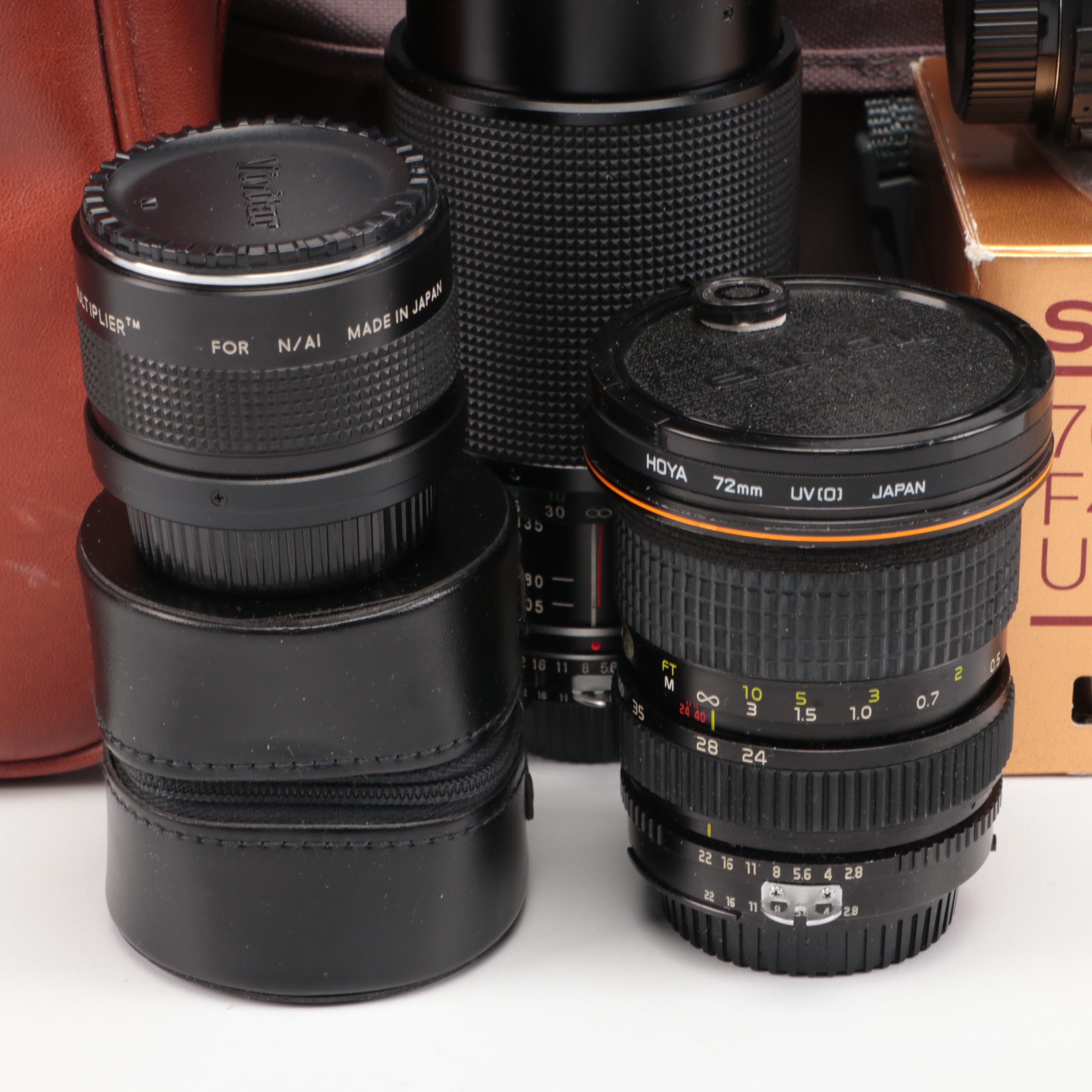 Nikon FE with MD-12 Motor Drive with Other Camera and Accessories