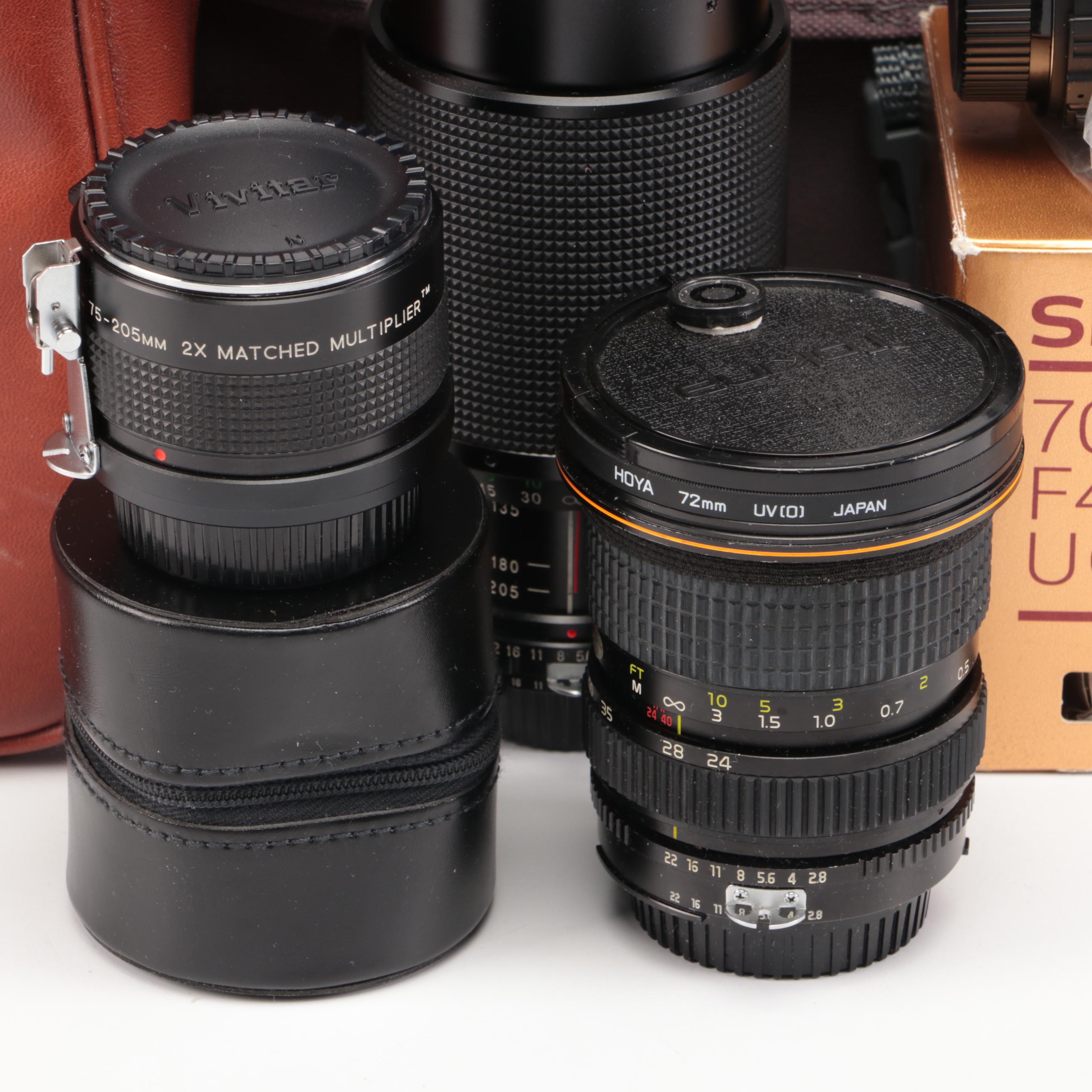 Nikon FE with MD-12 Motor Drive with Other Camera and Accessories