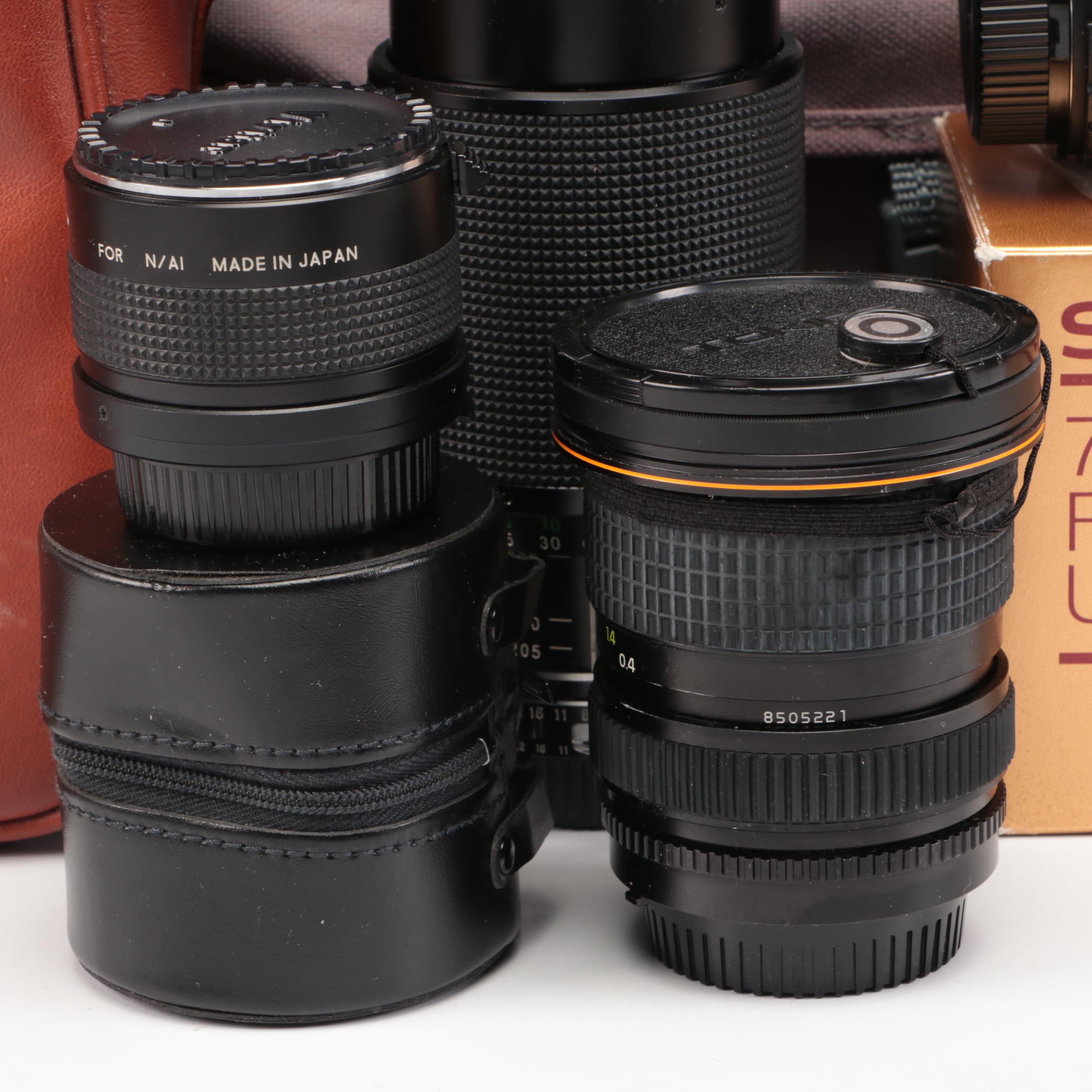 Nikon FE with MD-12 Motor Drive with Other Camera and Accessories