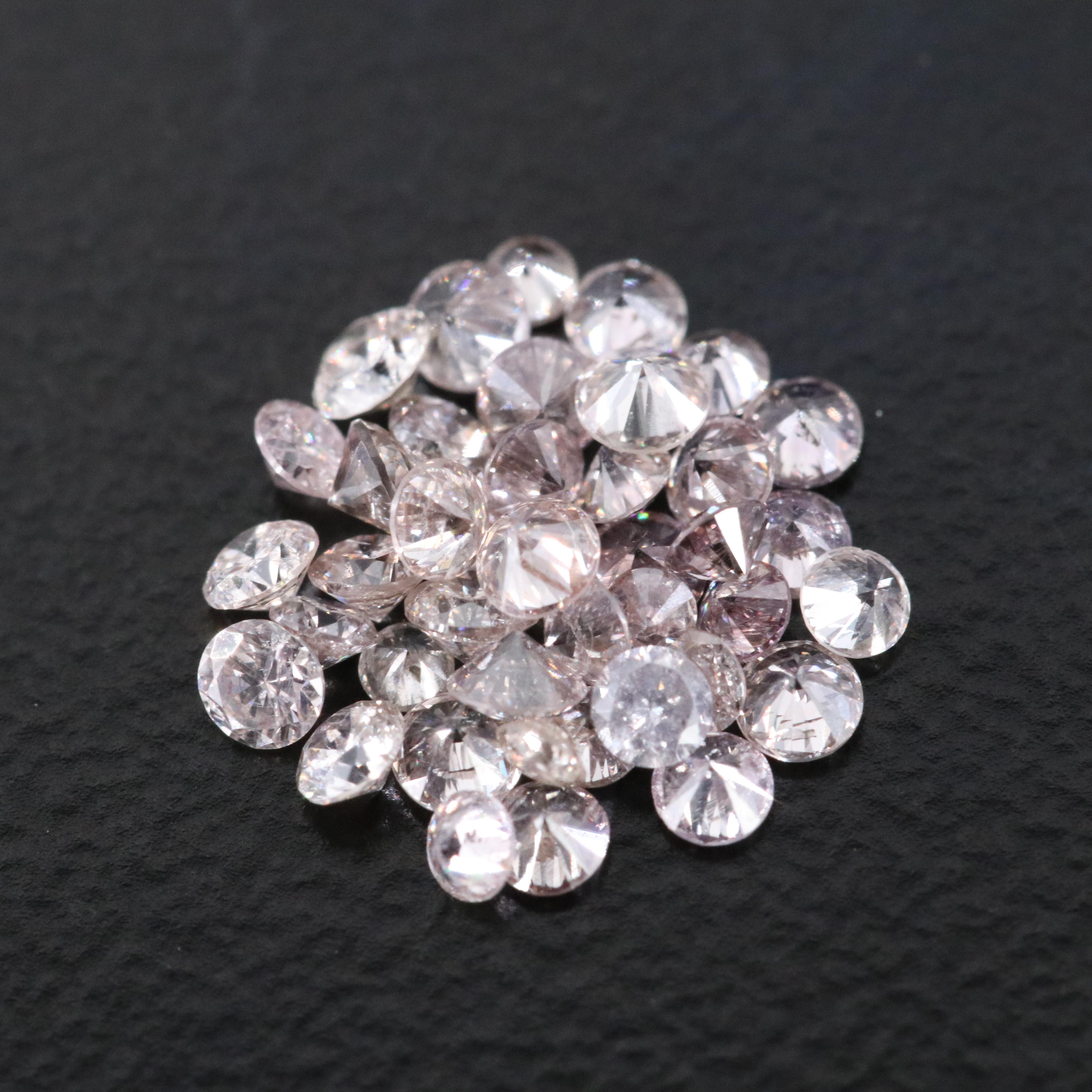 Loose 0.98 CTW Diamond Lot Including Fancy Pink