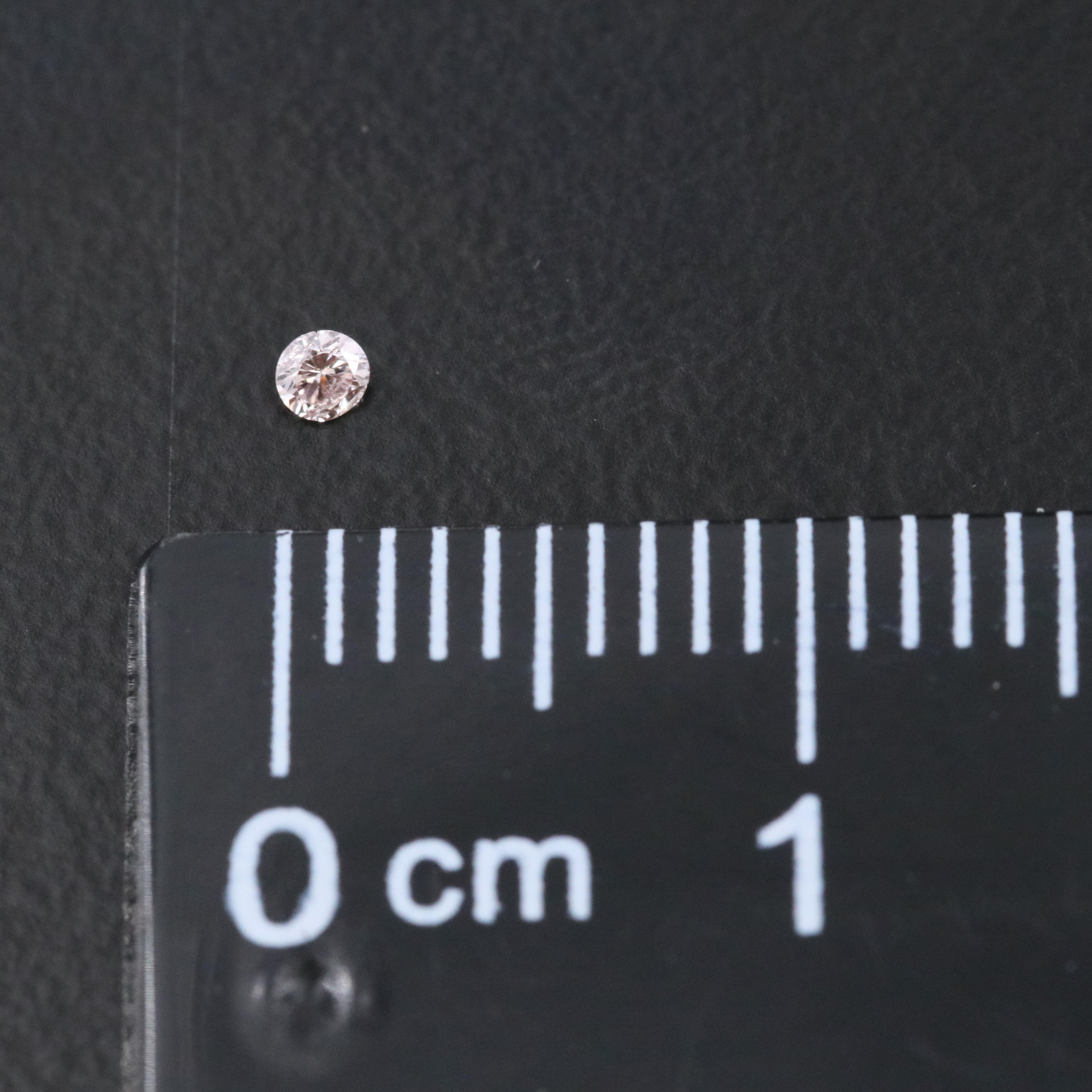 Loose 0.98 CTW Diamond Lot Including Fancy Pink