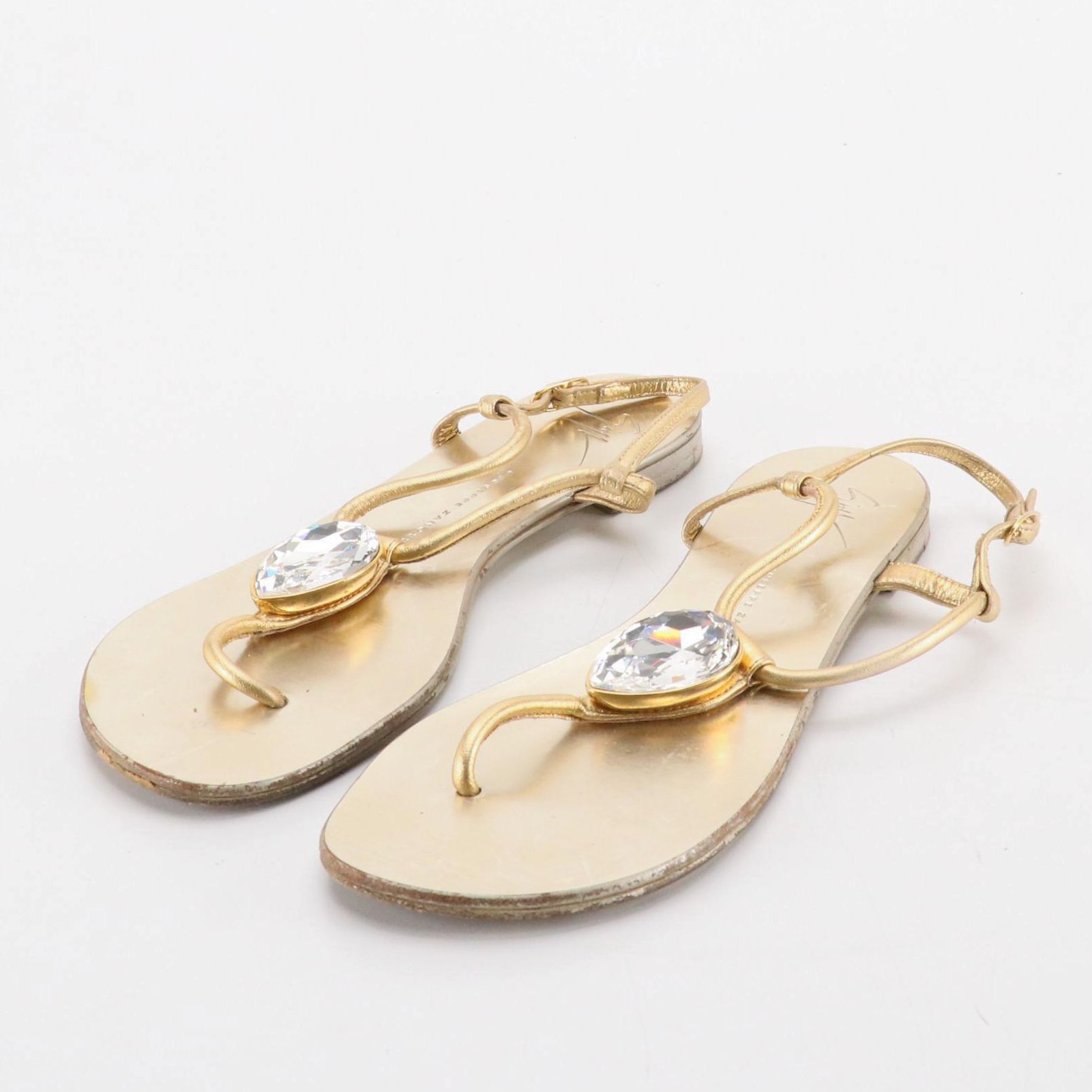 Giuseppe Zanotti Rhinestone Embellished Ankle Wrap Sandals in Gold Leather