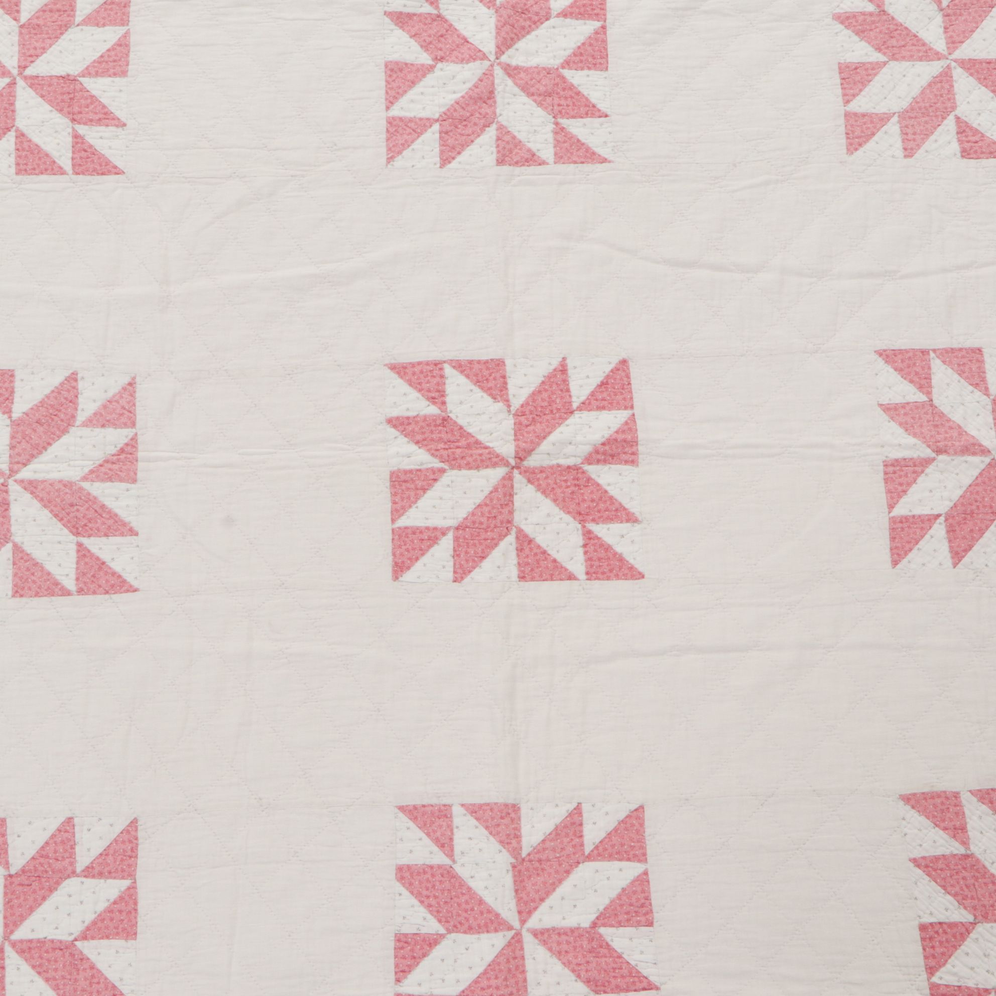 Hand-Crafted Pink and White Eight-Point Star Quilt